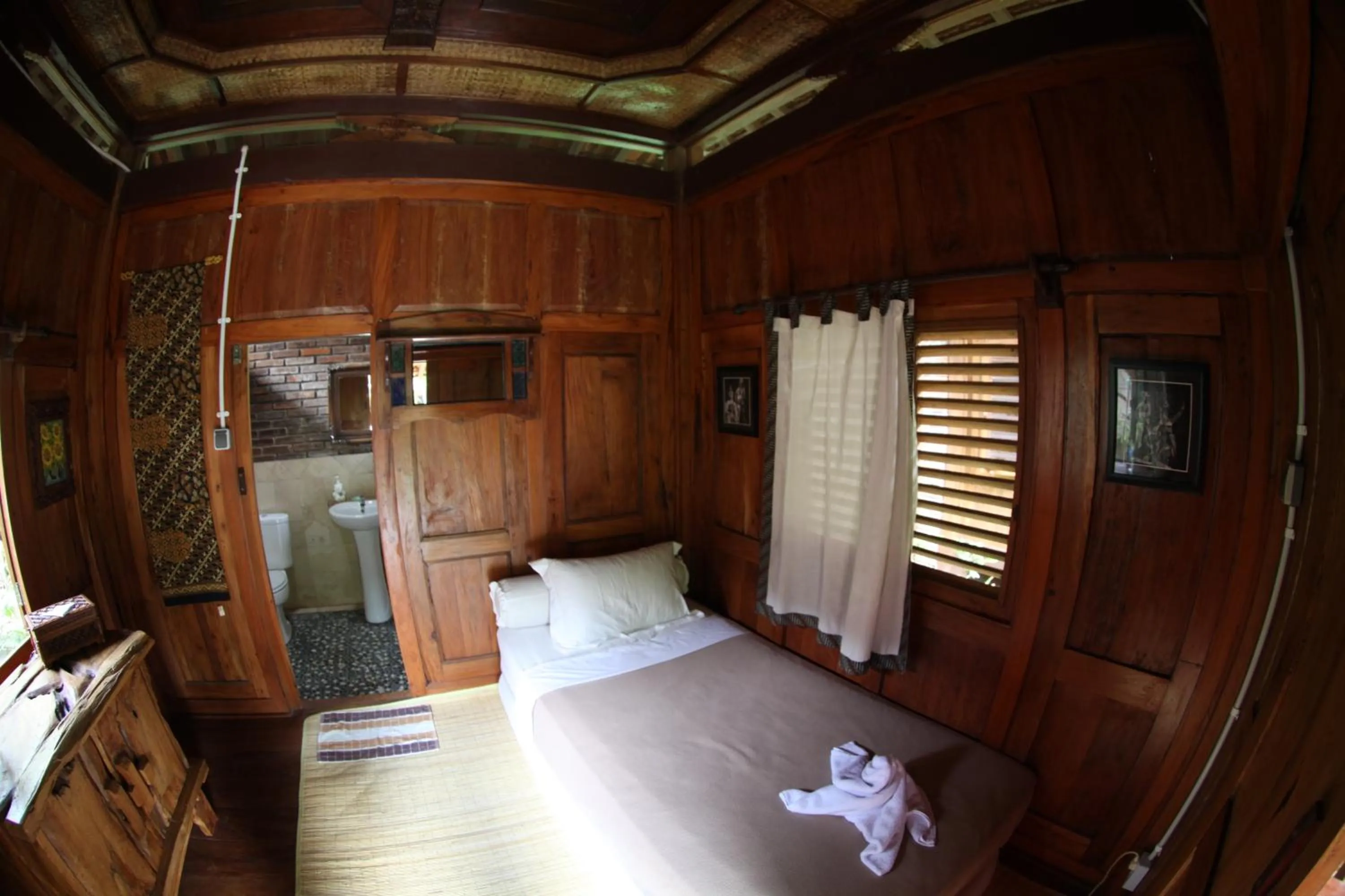 Bed in Omah Garengpoeng Guest House