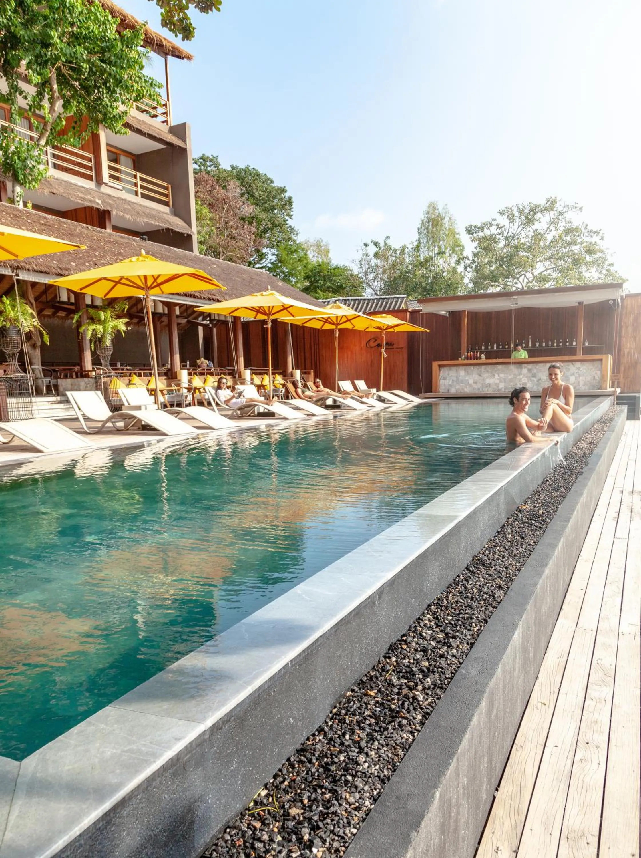 Pool view in Beach Club by Haadtien