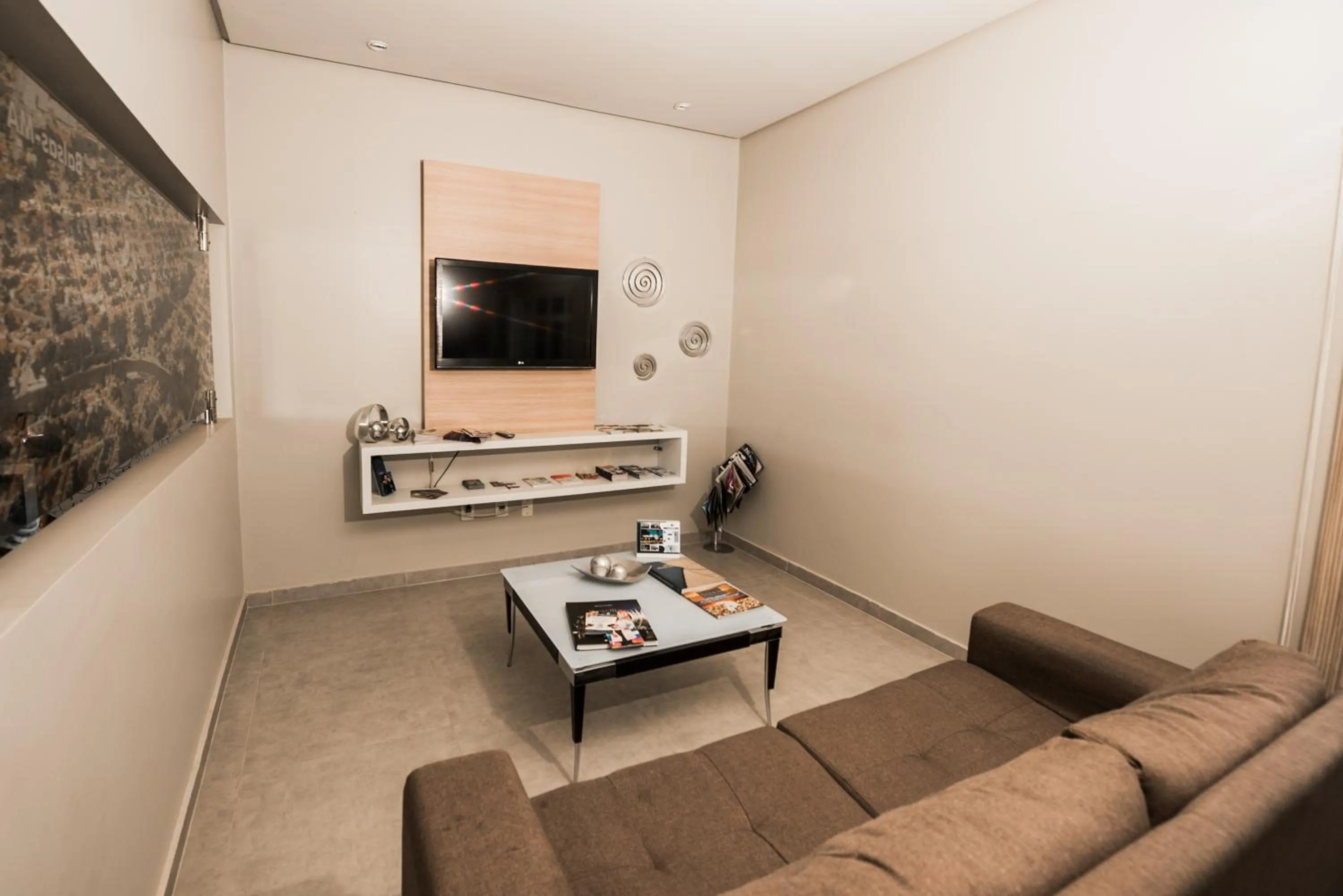 Communal lounge/ TV room in BALSAS PREMIER HOTEL