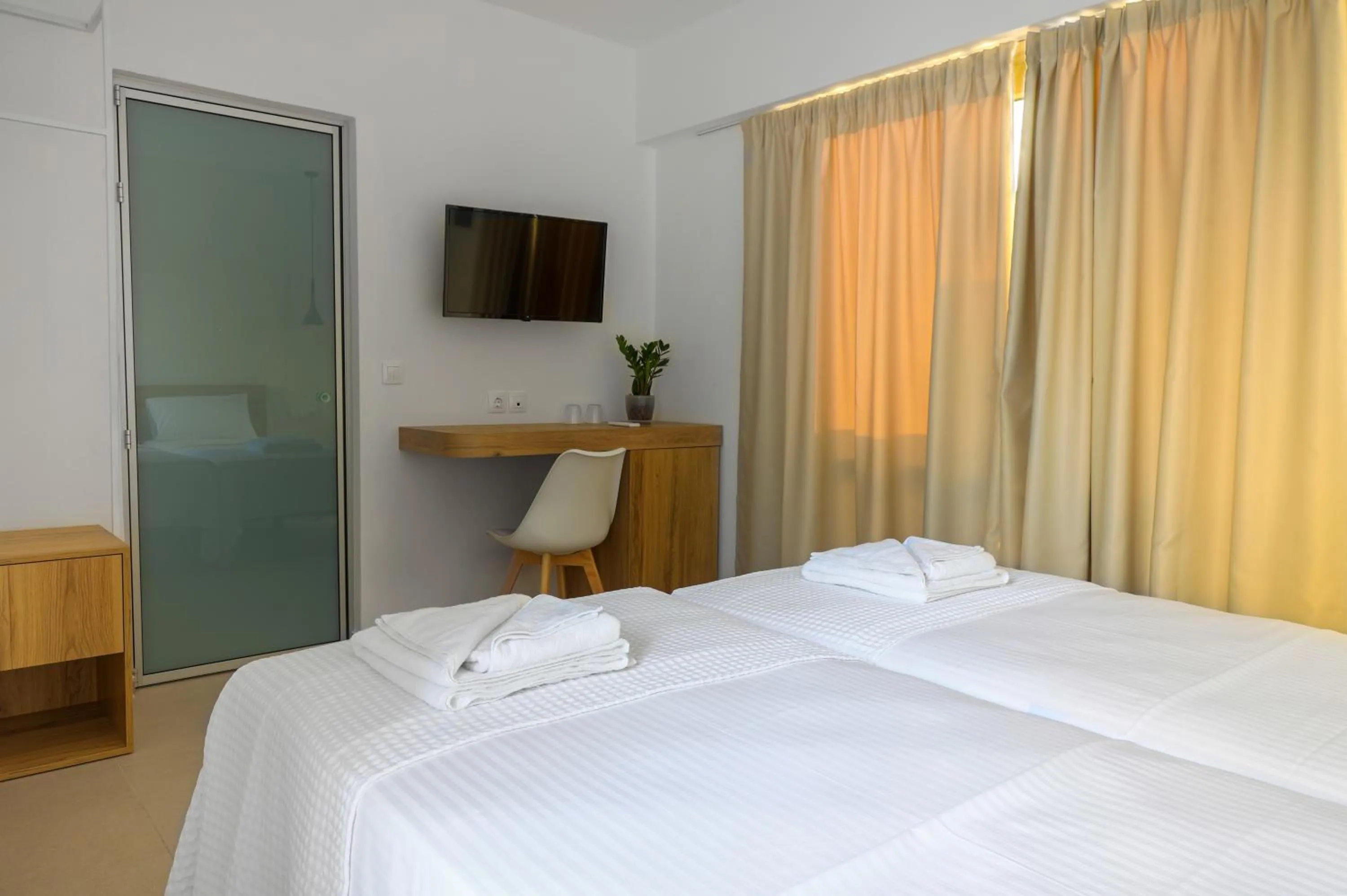 Bed in Sea Breeze Hotel