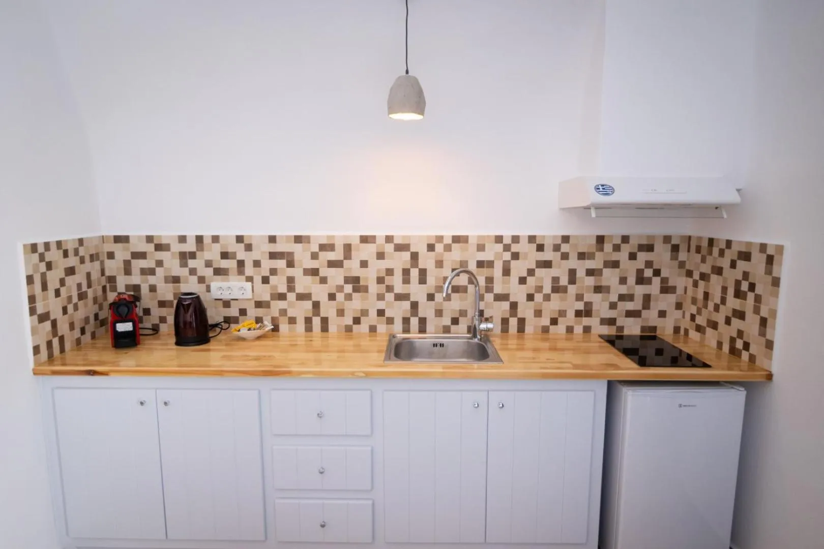 kitchen in Sun Angelos Oia - Luxury Cave Suites