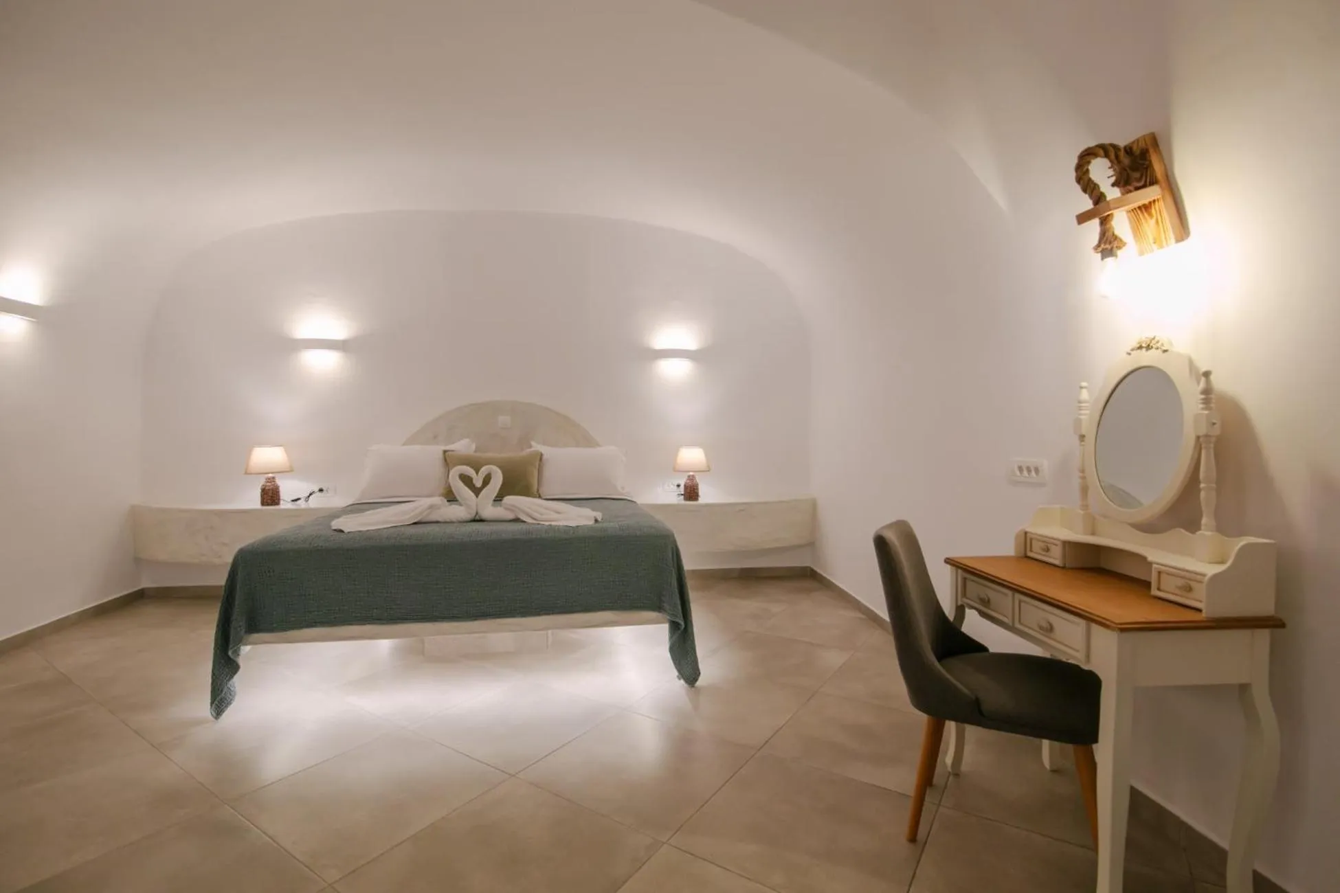 Bed in Sun Angelos Oia - Luxury Cave Suites