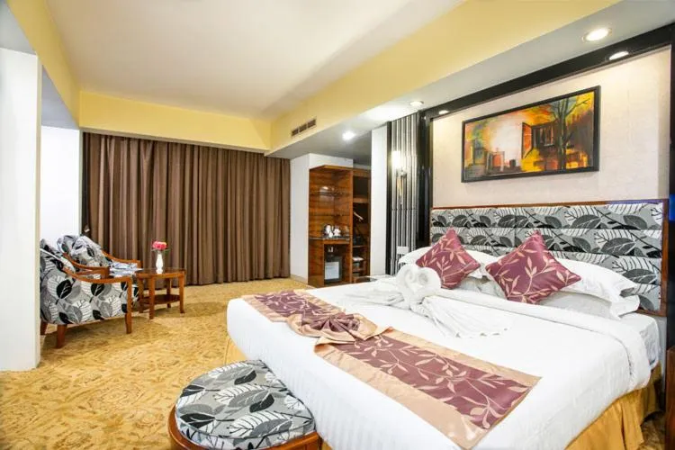 Bed in Hotel Star Pacific