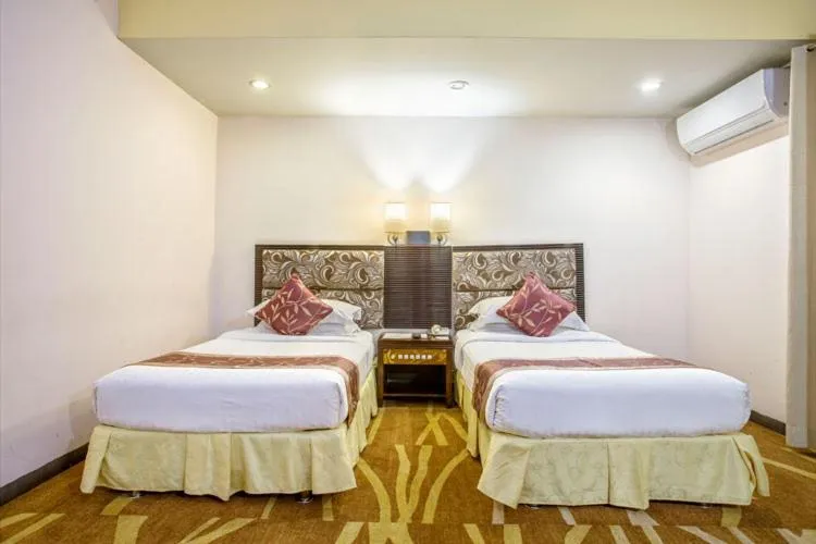 Bed in Hotel Star Pacific