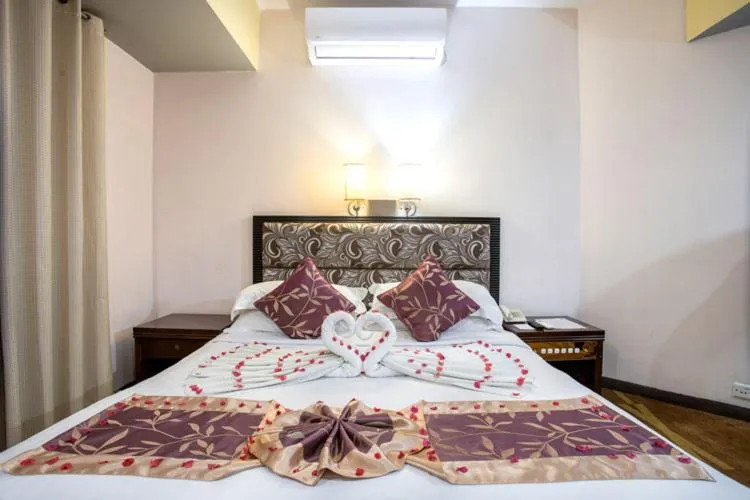 Bed in Hotel Star Pacific