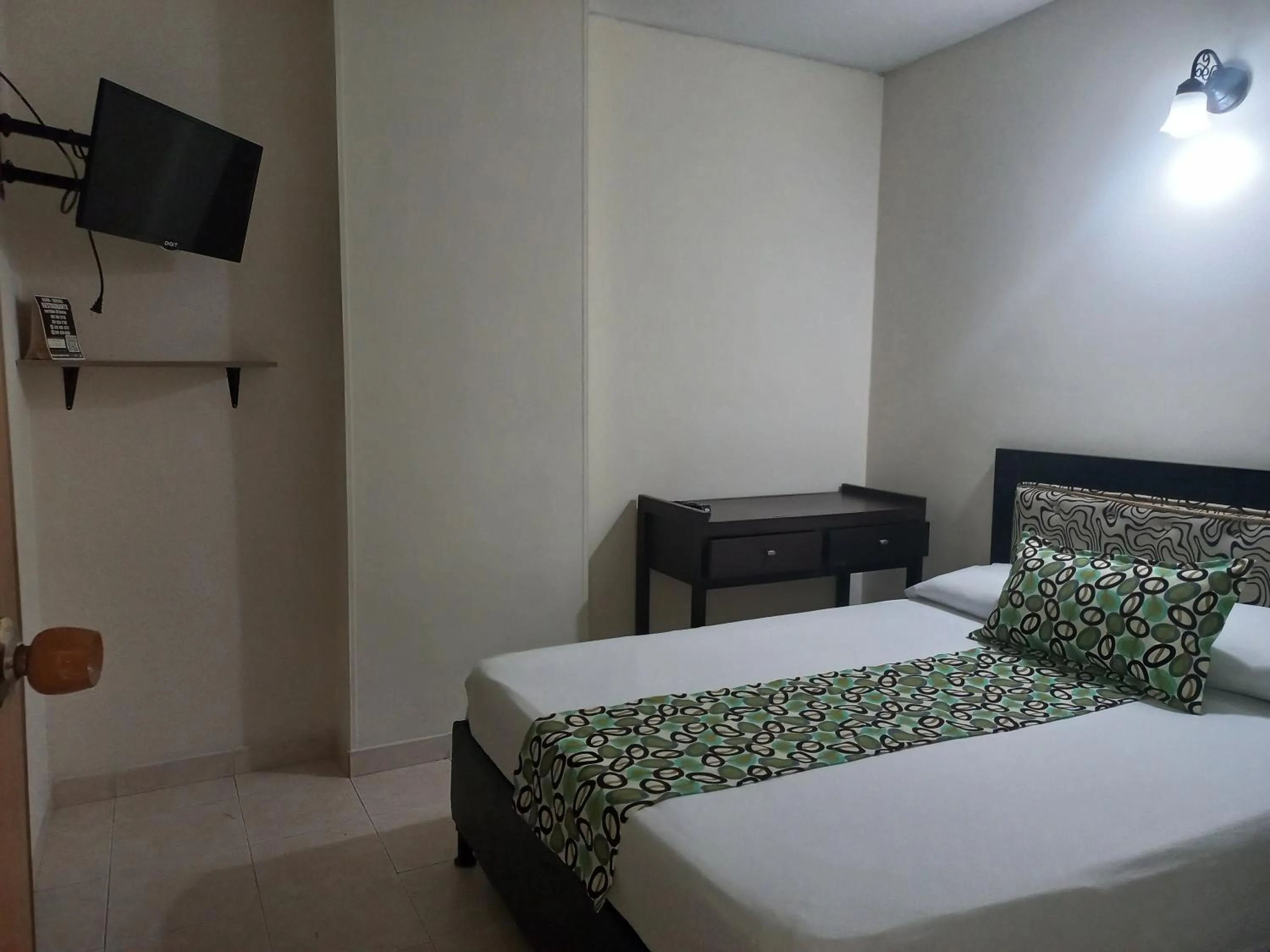 Bed in Hotel Los Tunjos