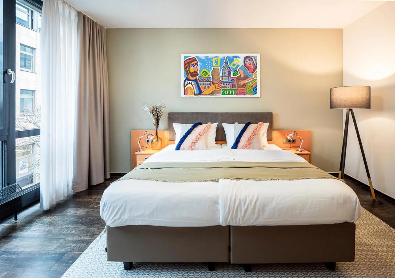 Bed in KONCEPT HOTEL Benedikt