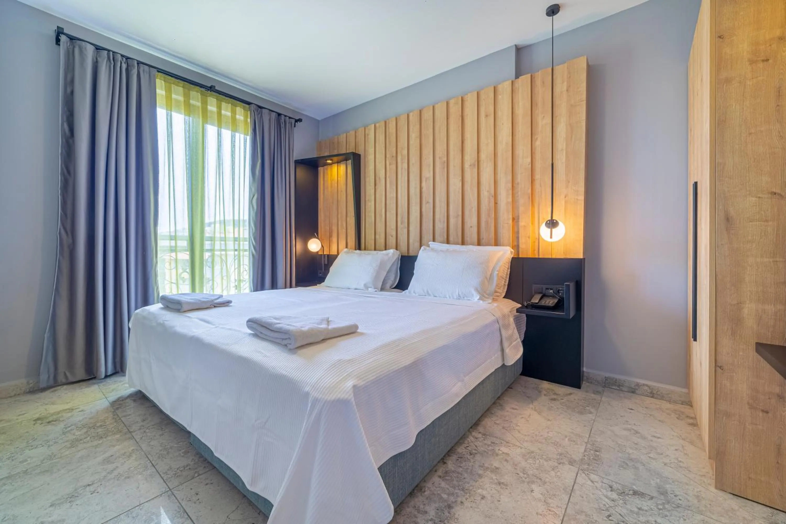 Bed in Aria Riva Apart Hotel