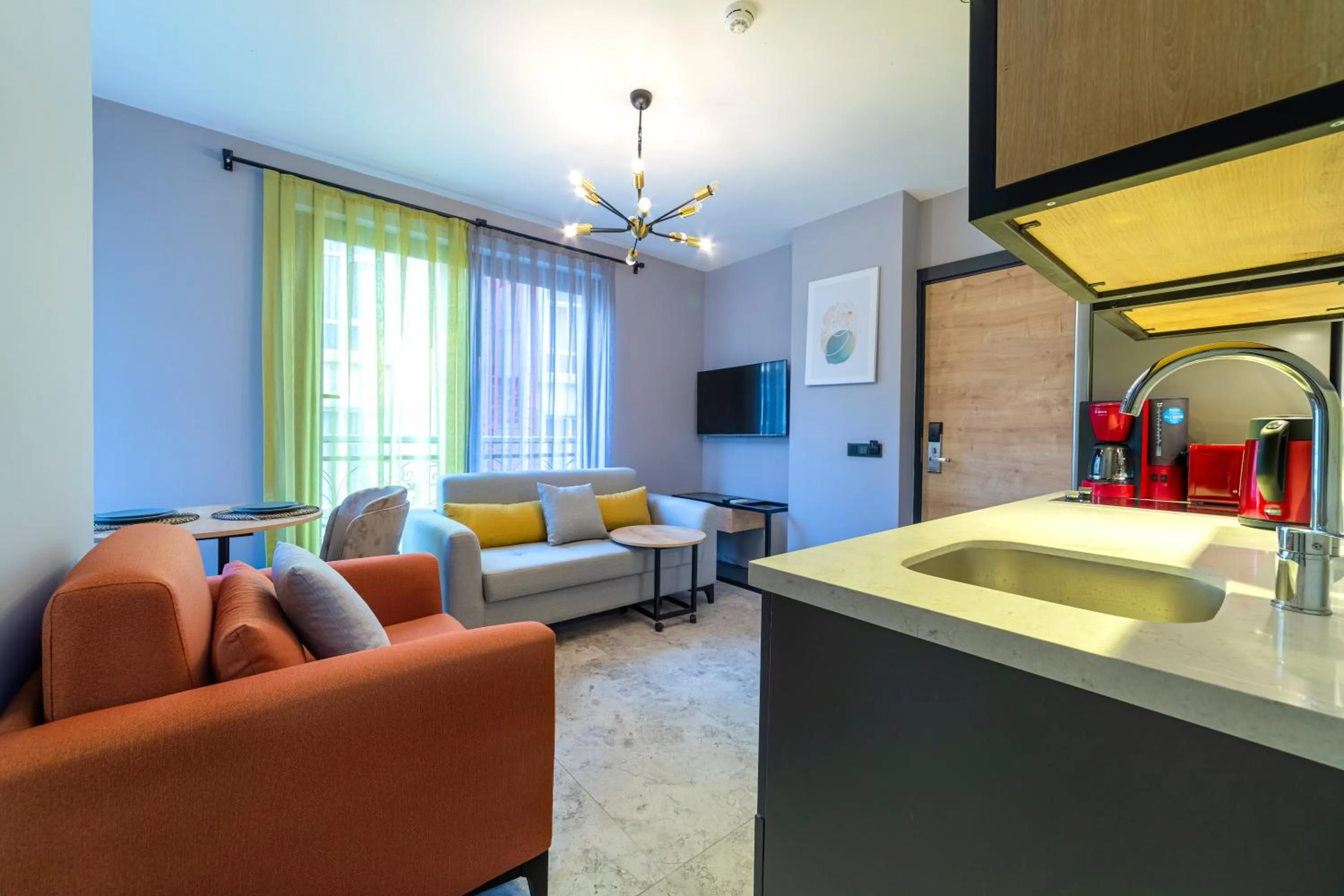 TV and multimedia in Aria Riva Apart Hotel