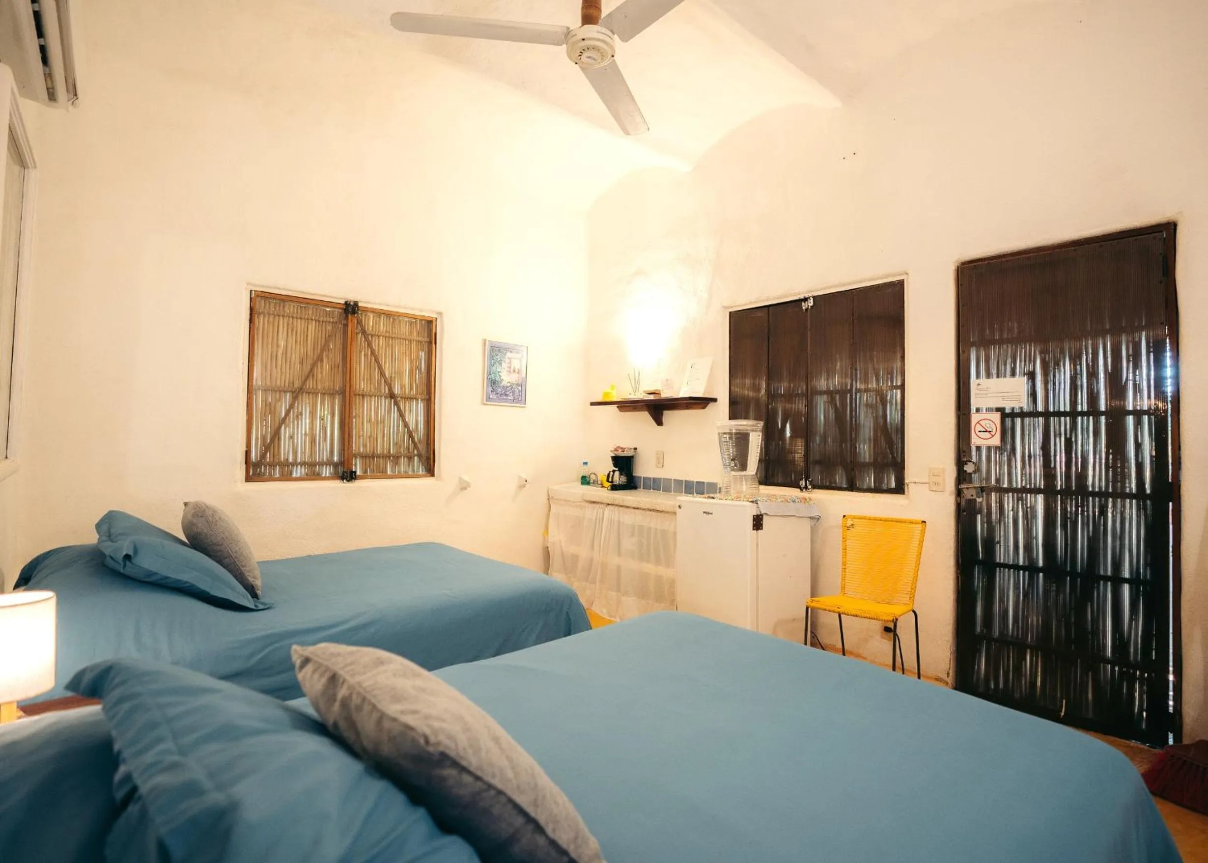 Bed in Junto al Rio Bungalows & Suites