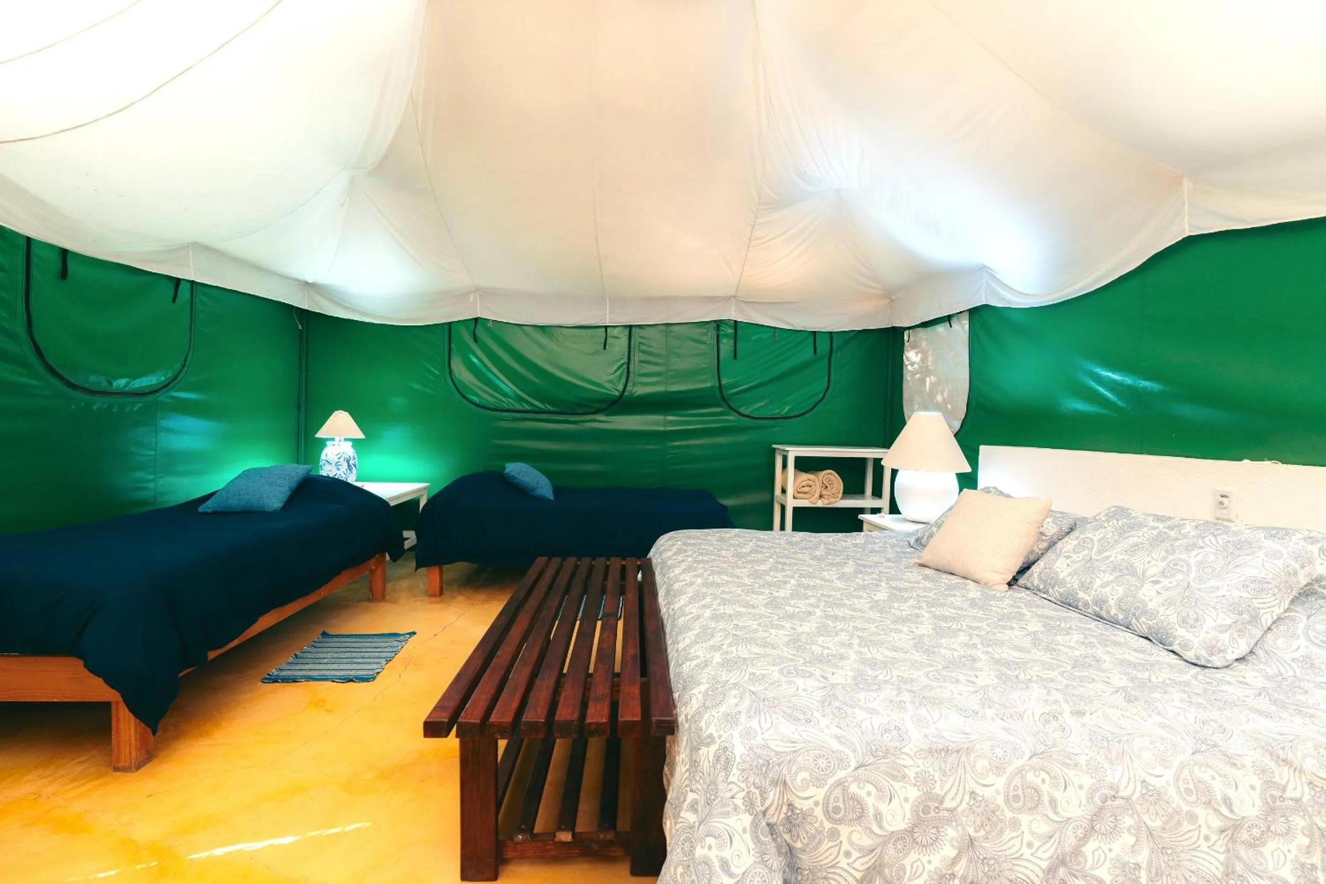 Bed in Junto al Rio Bungalows & Suites