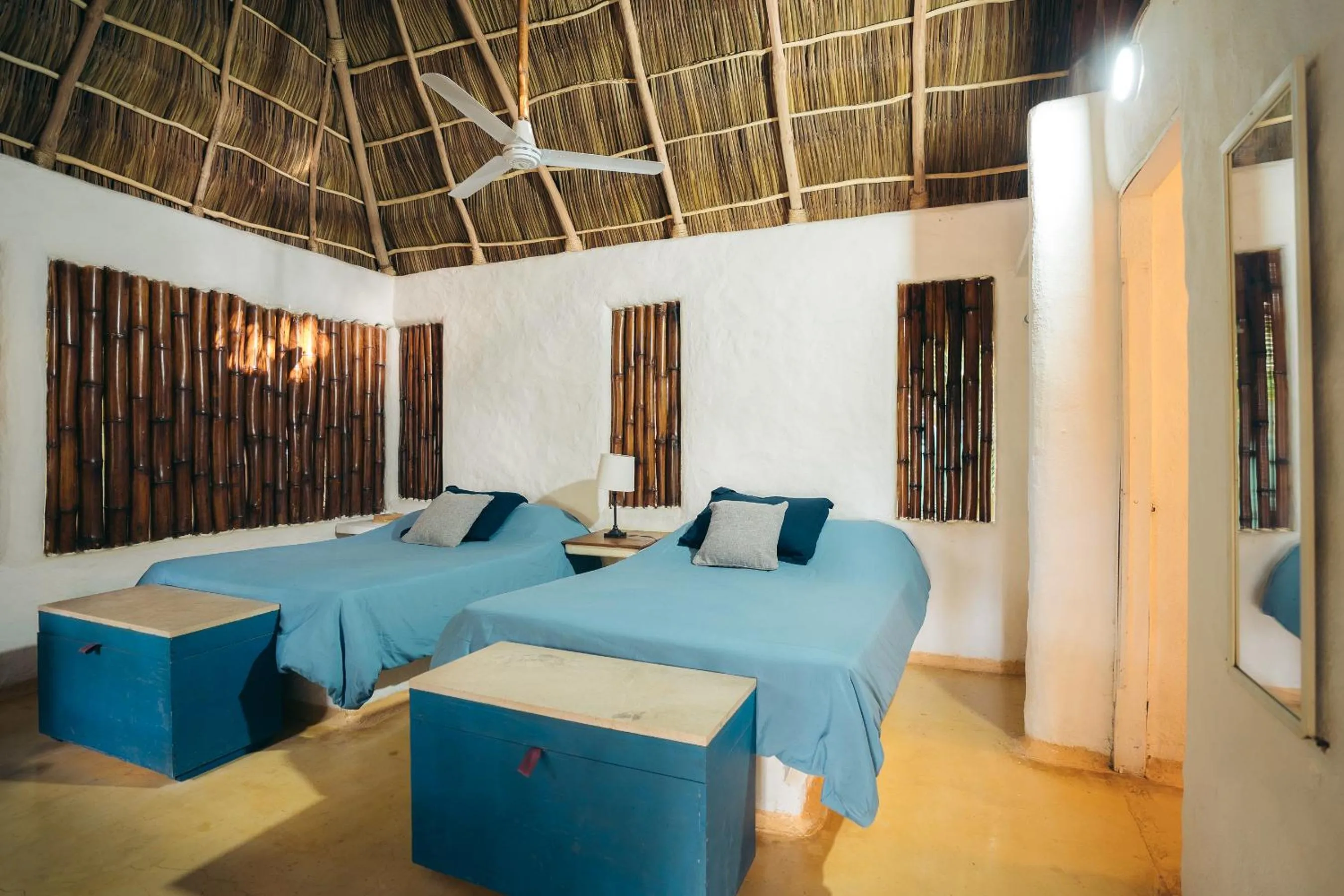 Bed in Junto al Rio Bungalows & Suites