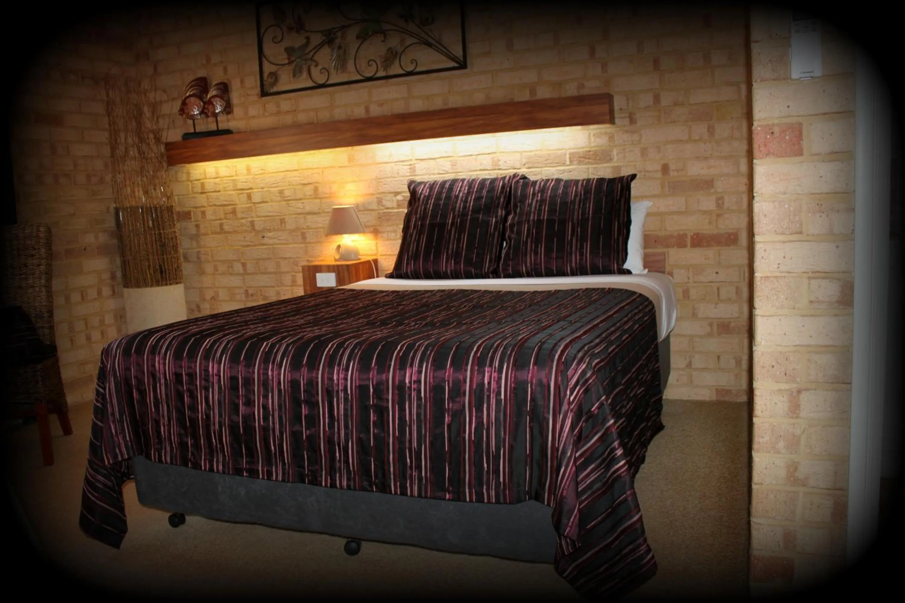 Bed in York's Boutique Motel