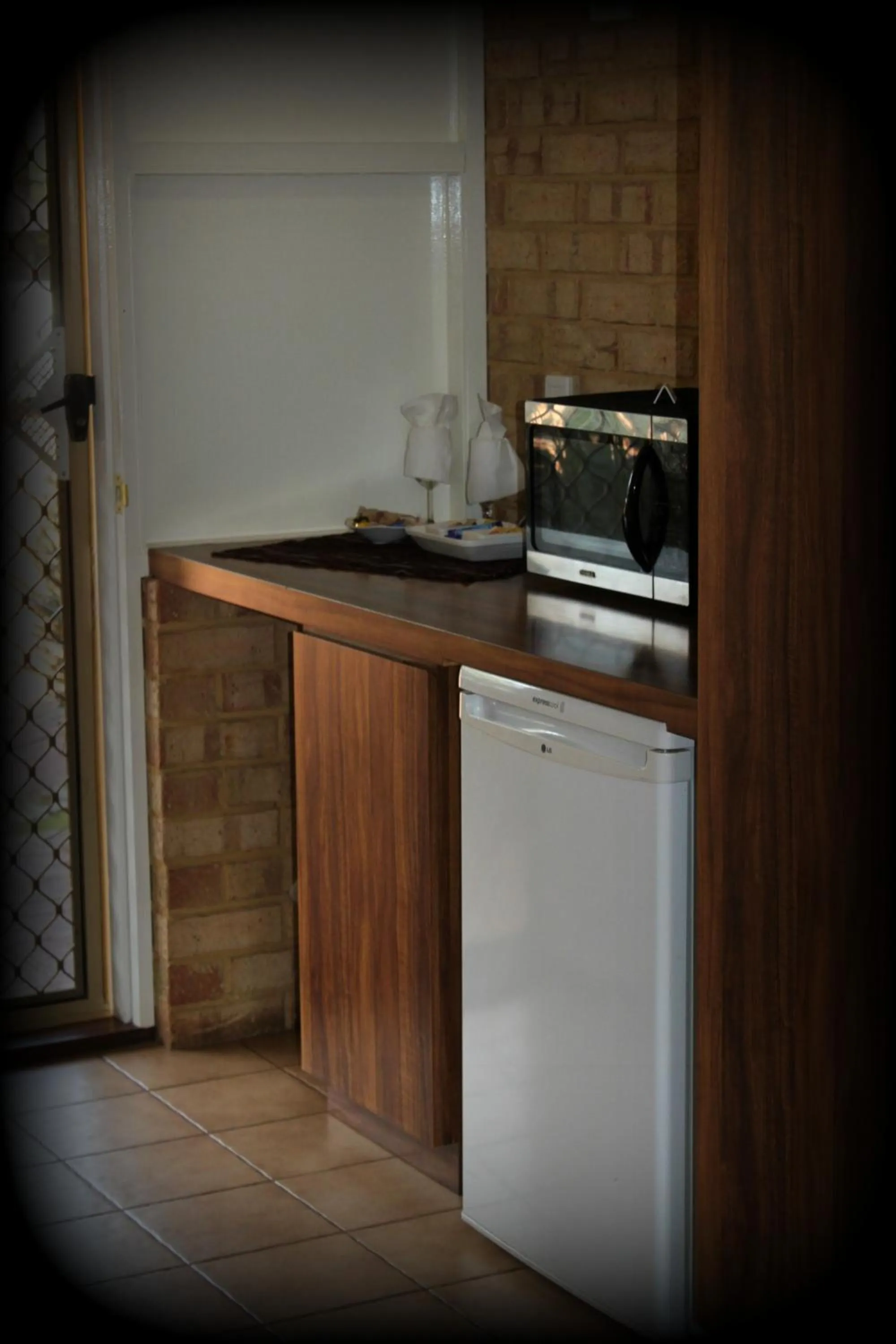 Kitchen or kitchenette in York's Boutique Motel