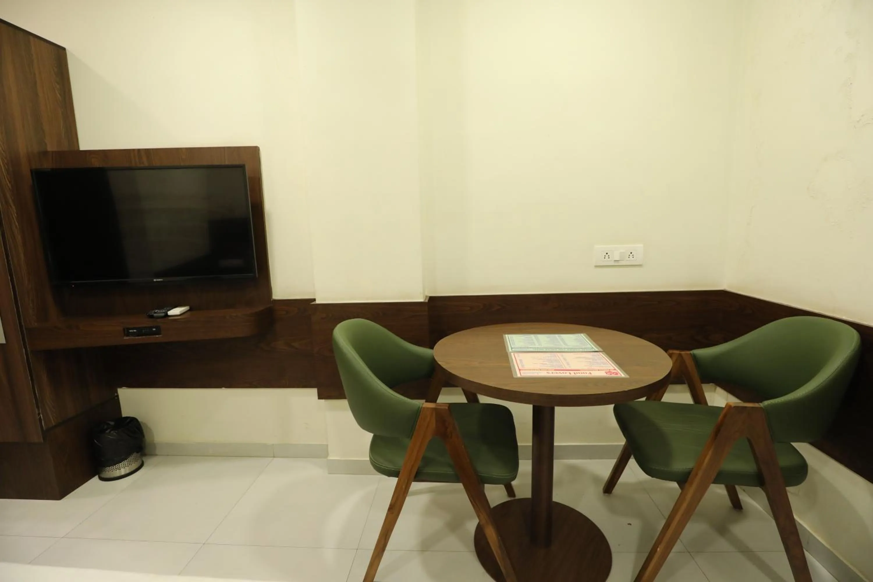 TV and multimedia in Greenotel Rooms Hazira, Surat