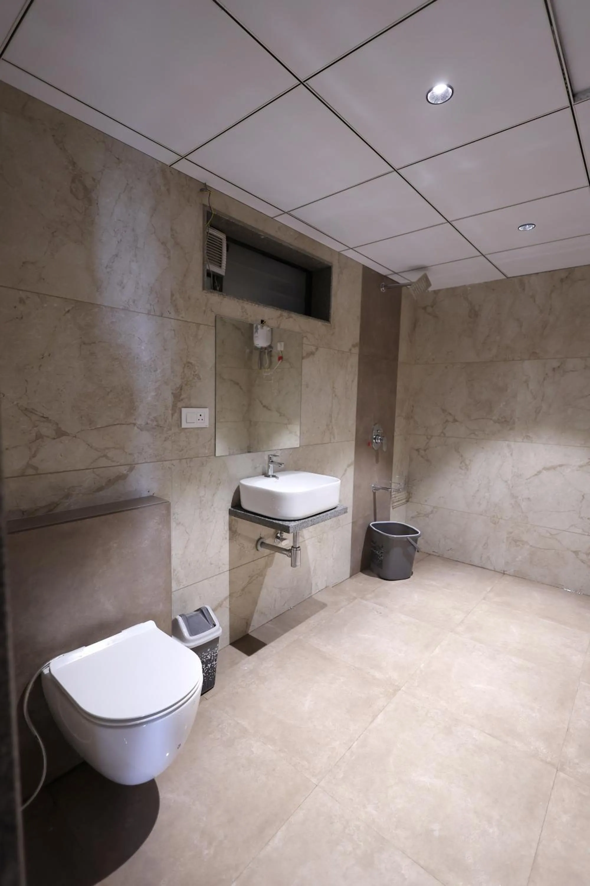 Bathroom in Greenotel Rooms Hazira, Surat