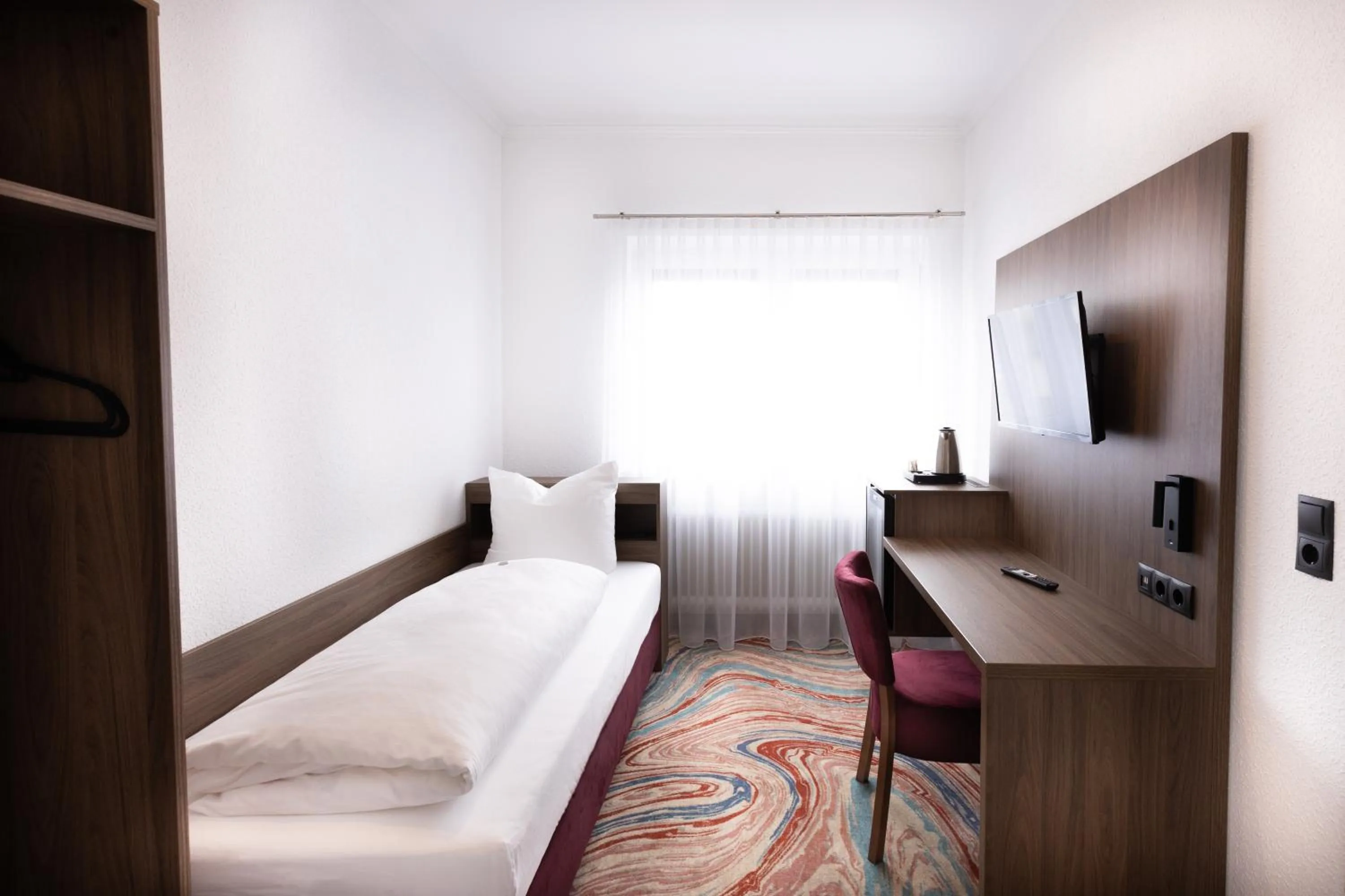 Photo of the whole room, Bed in Firzlaff's Hotel