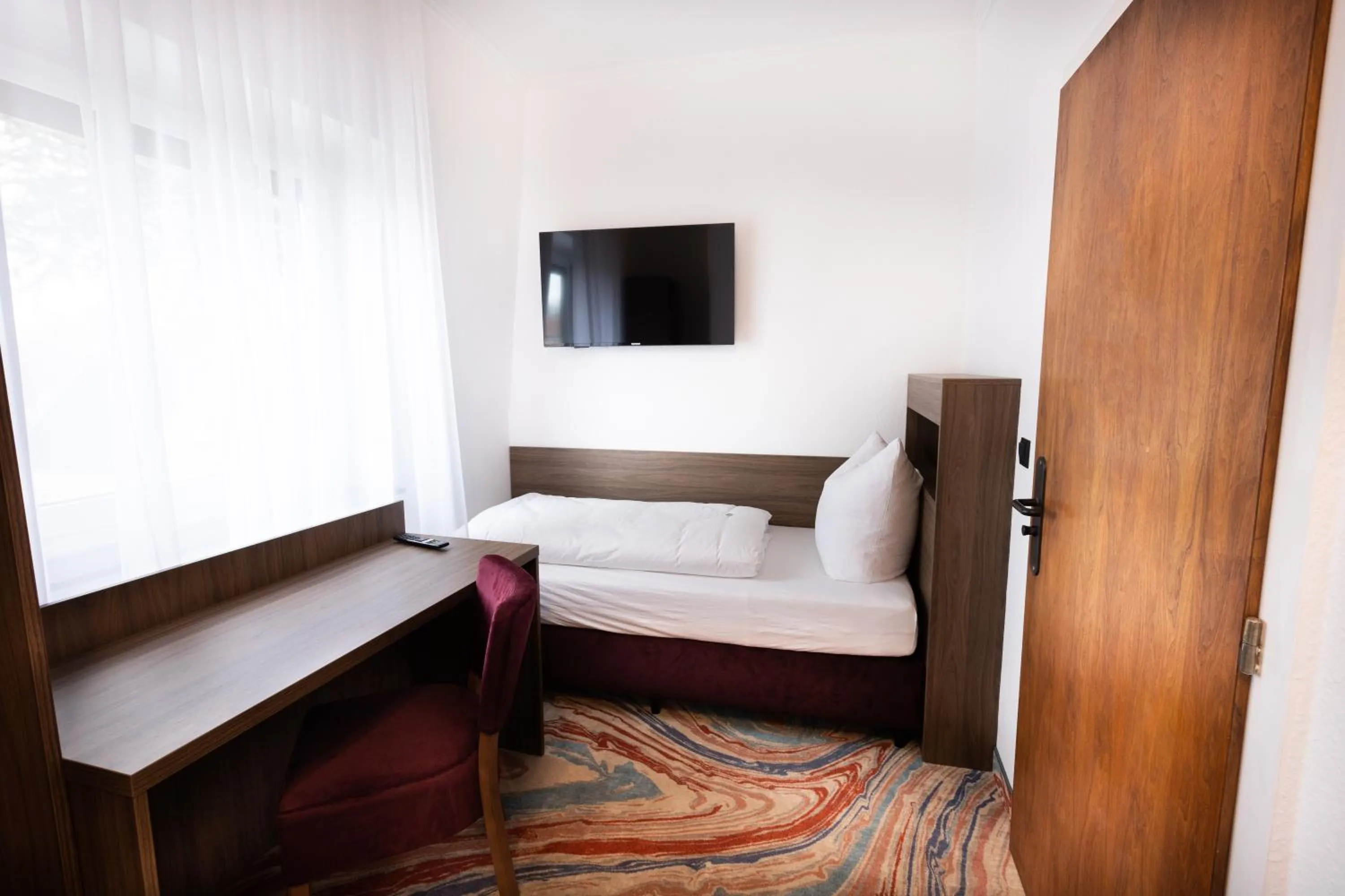 Photo of the whole room, Bed in Firzlaff's Hotel