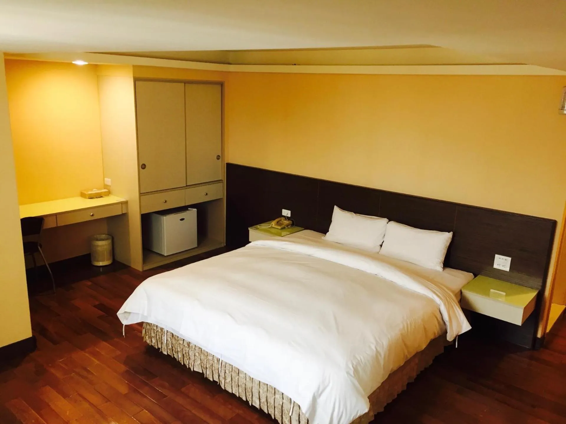 Bed in Tai Shinu Hotel