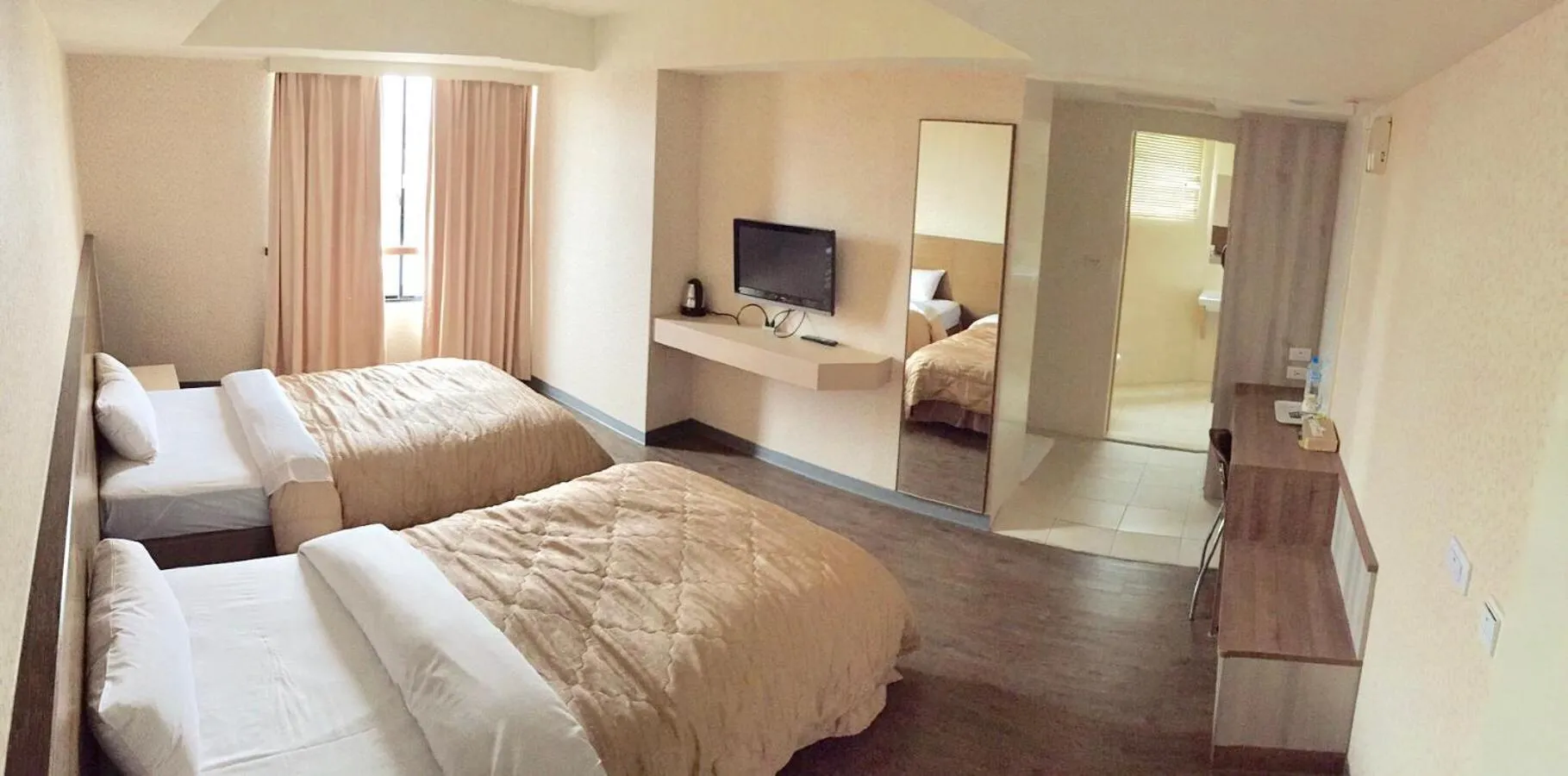 Bed in Tai Shinu Hotel