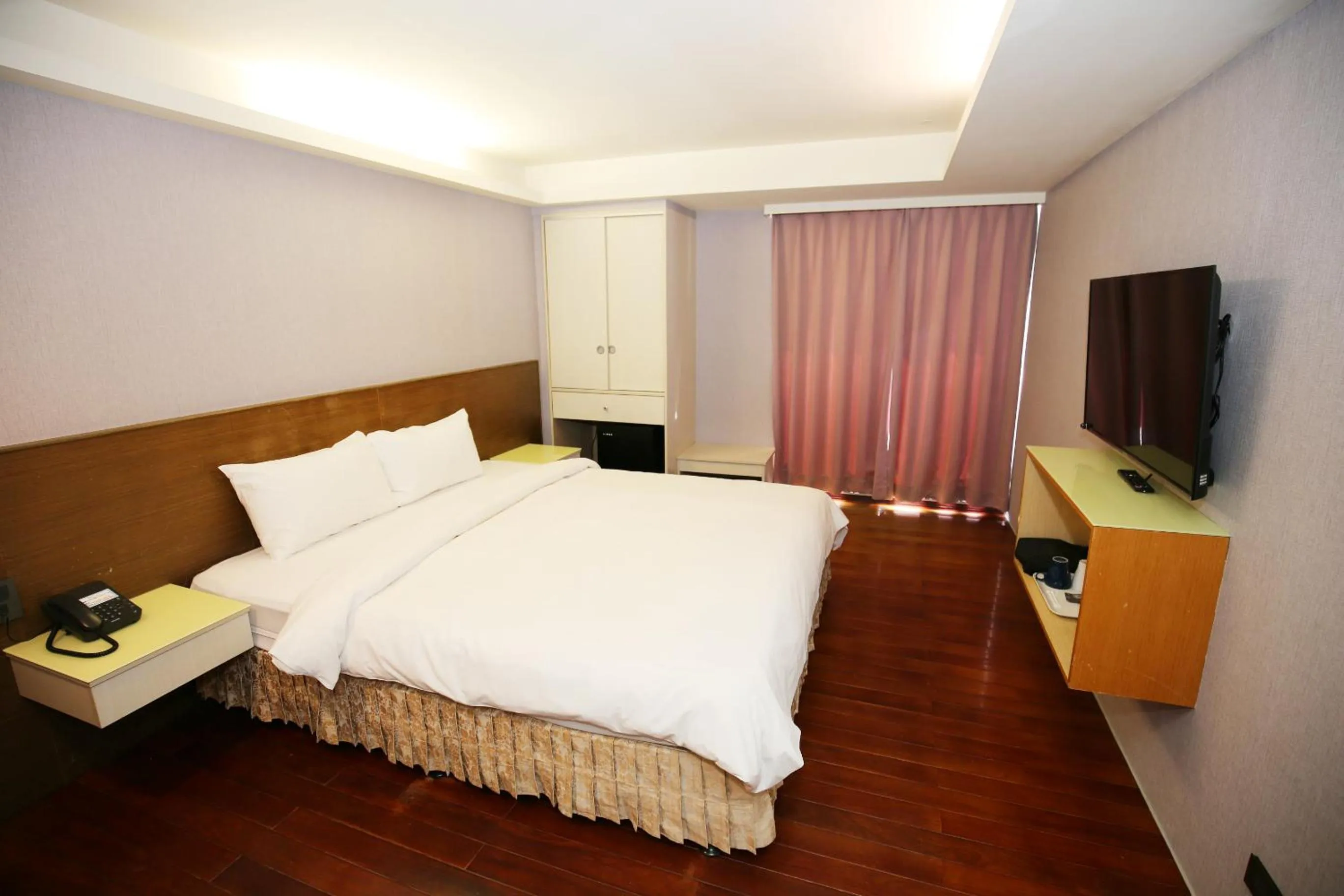 Bed in Tai Shinu Hotel