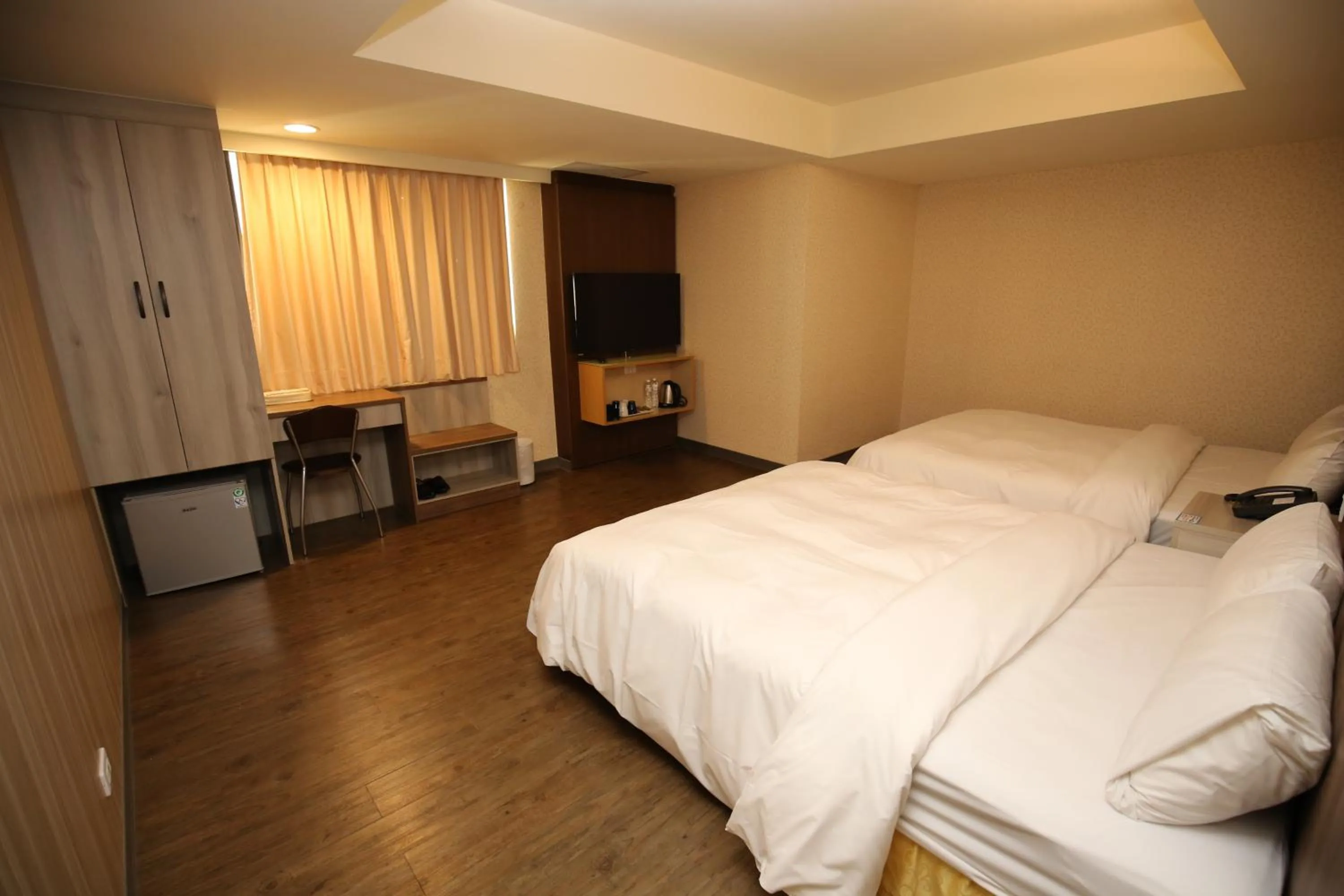 Bed in Tai Shinu Hotel