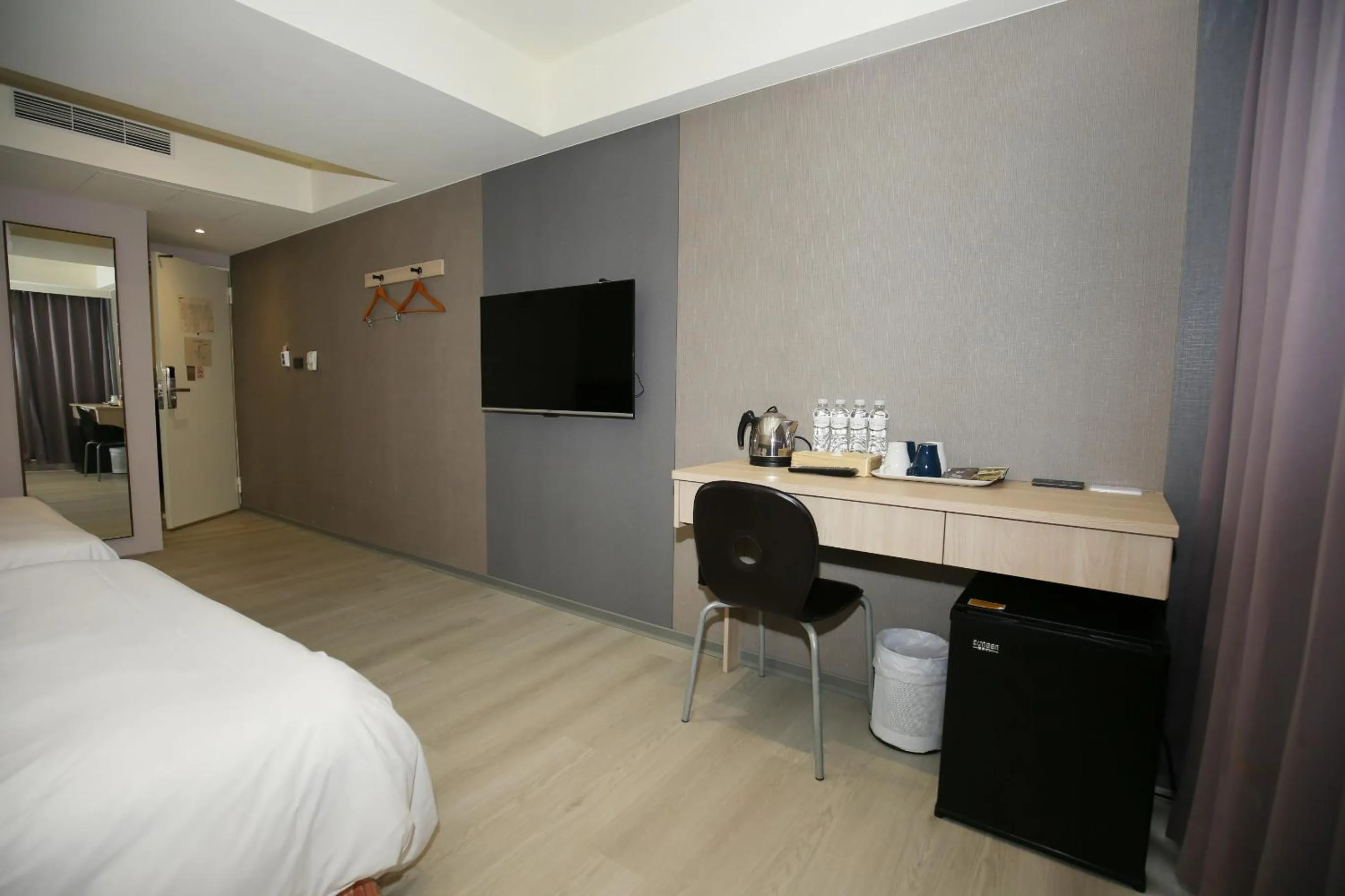 Bed in Tai Shinu Hotel