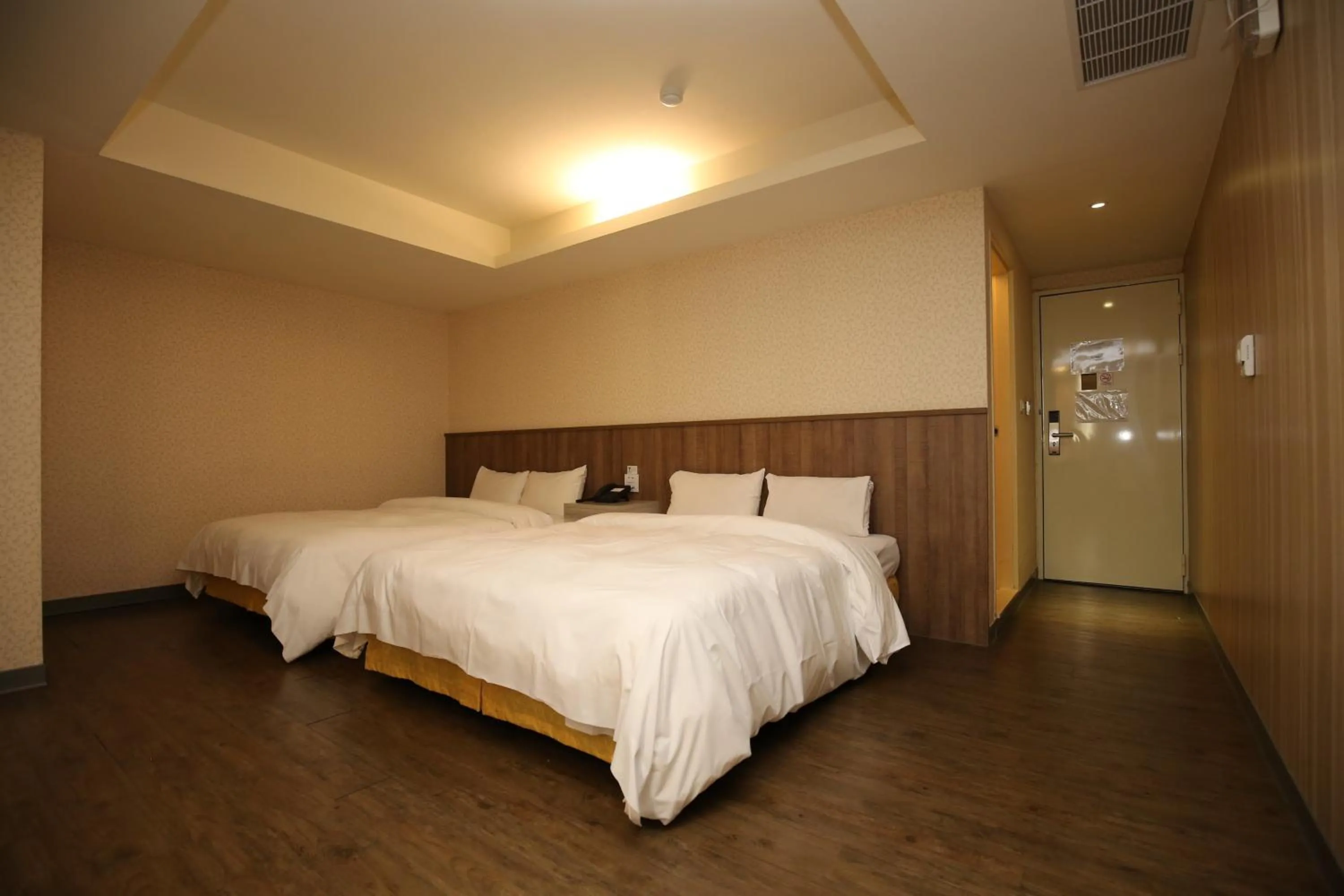 Bed in Tai Shinu Hotel