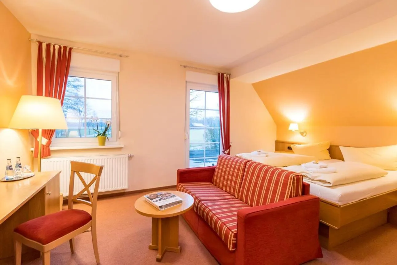 Bed in Brammers Landhotel Zum Wietzetal