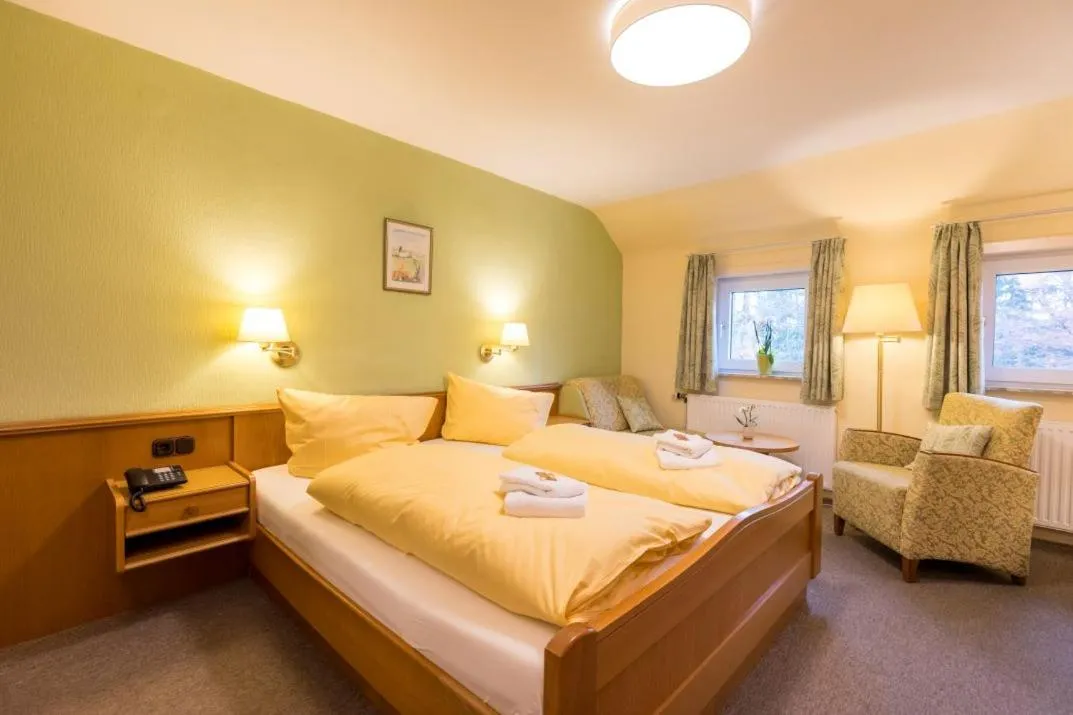 Bed in Brammers Landhotel Zum Wietzetal
