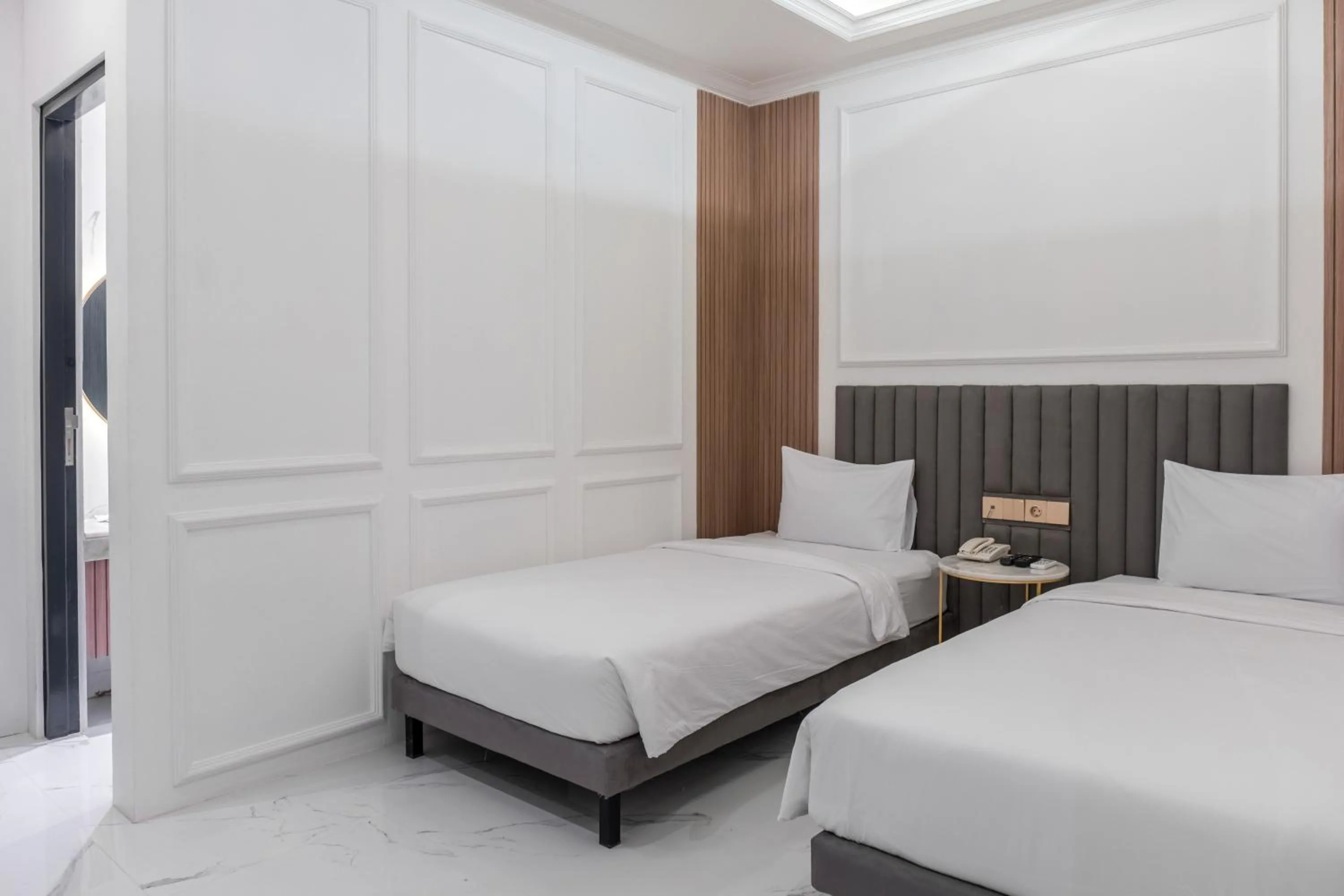 Bed in Kala Hotel Semarang