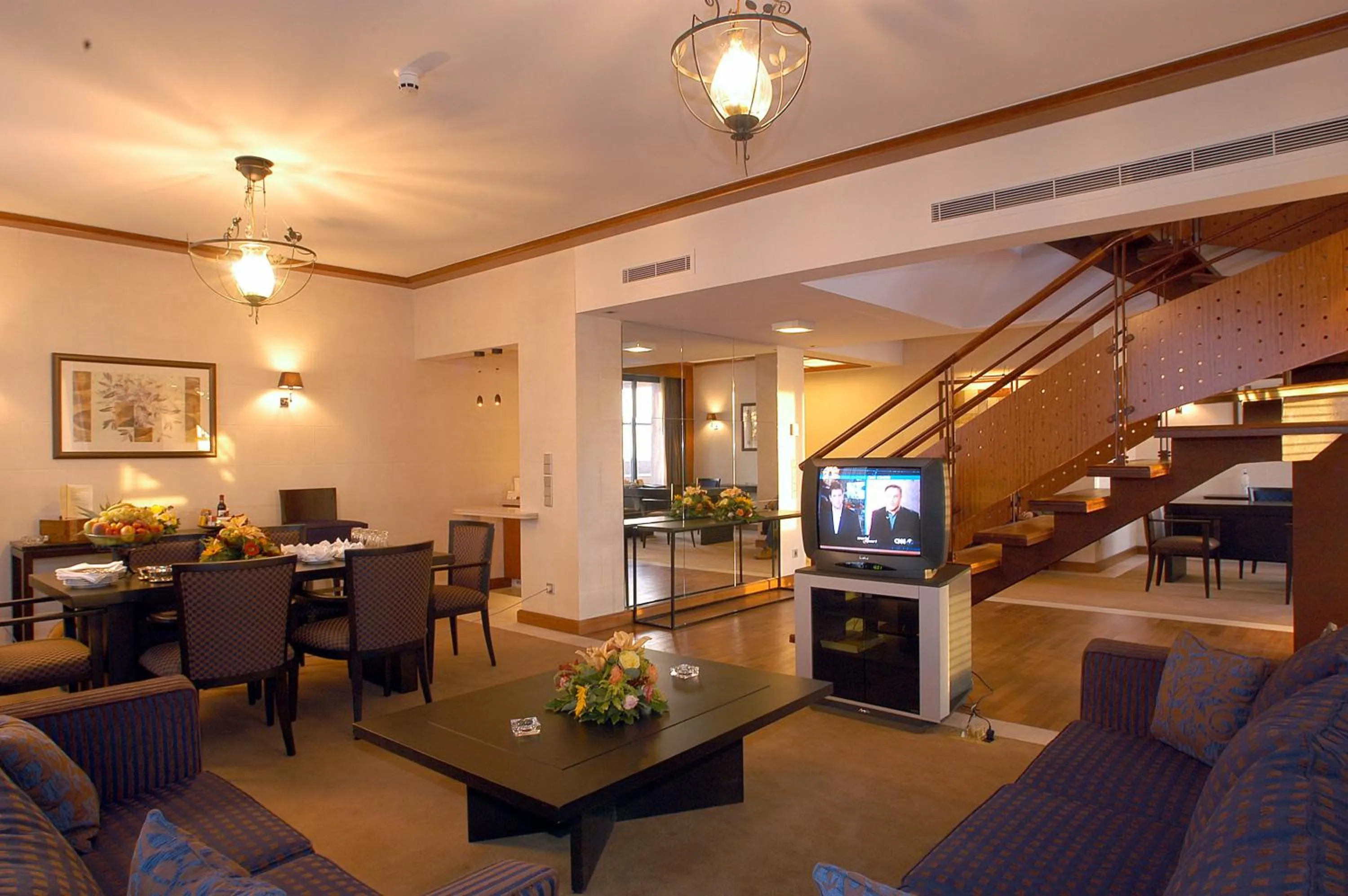 Communal lounge/ TV room in Crowne Plaza Beirut by IHG