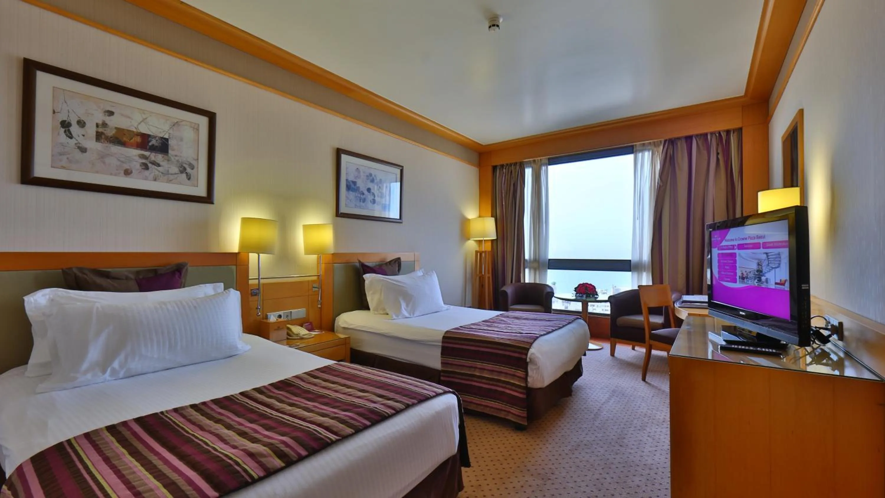 Photo of the whole room, Bed in Crowne Plaza Beirut by IHG