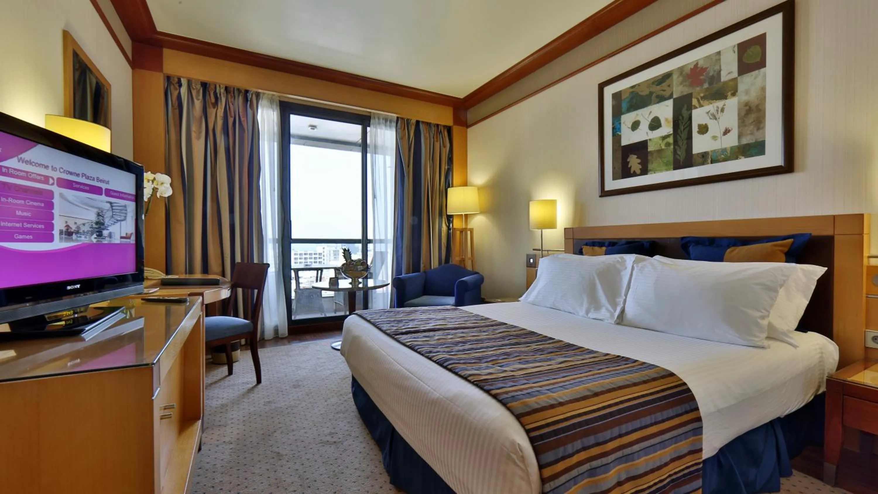 Photo of the whole room, Bed in Crowne Plaza Beirut by IHG