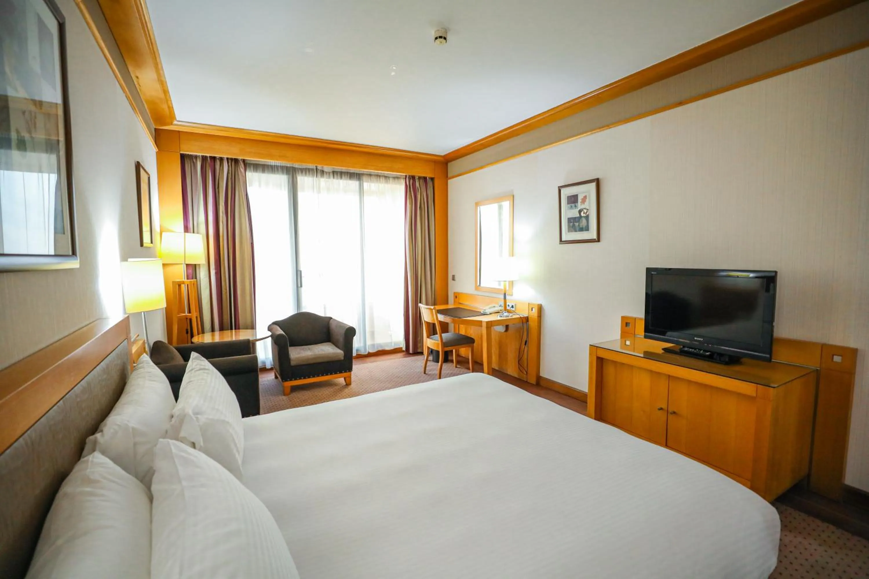 Bed in Crowne Plaza Beirut by IHG