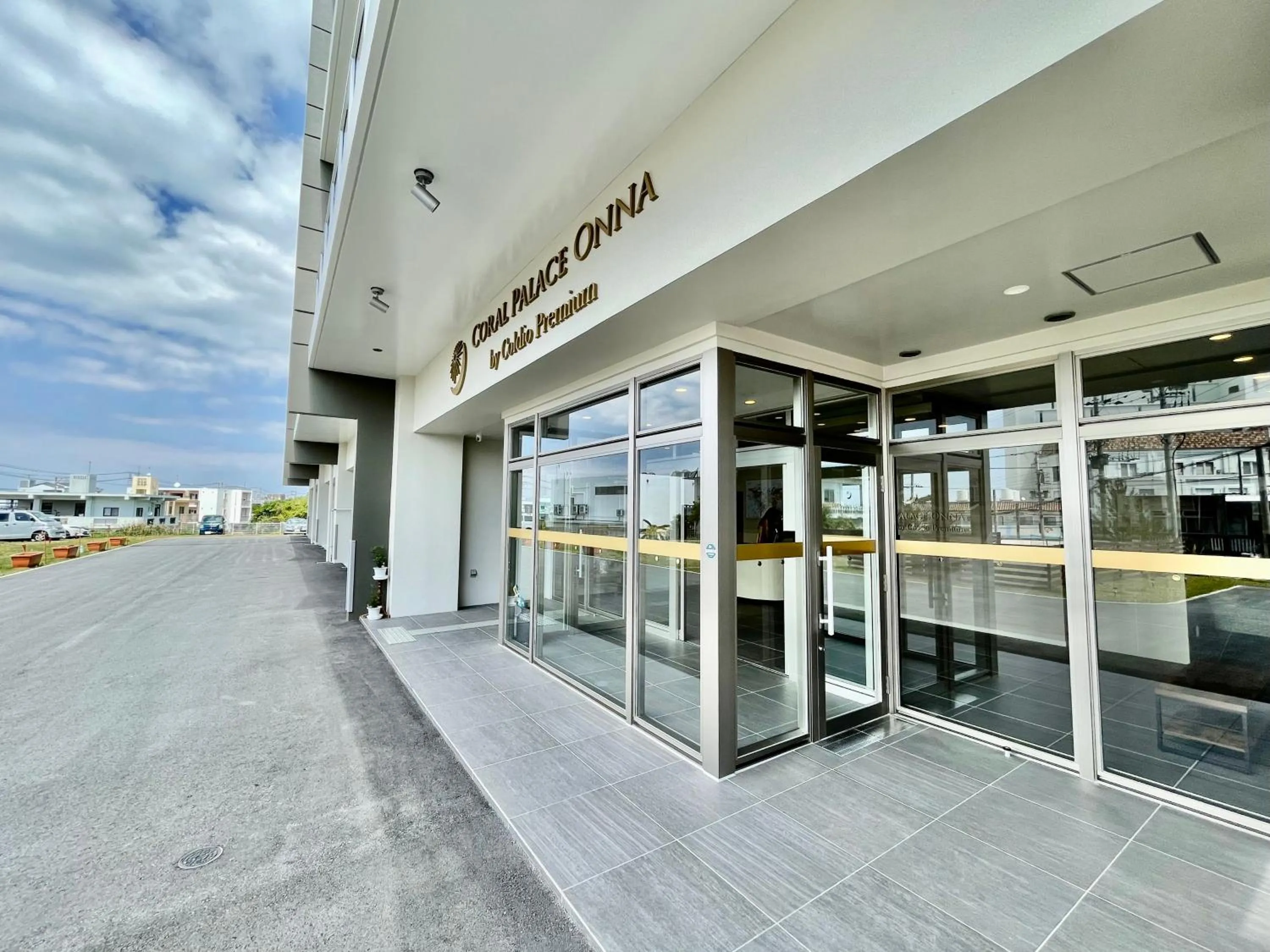 Facade/entrance in Coral Palace Onna by Sunset Avenue