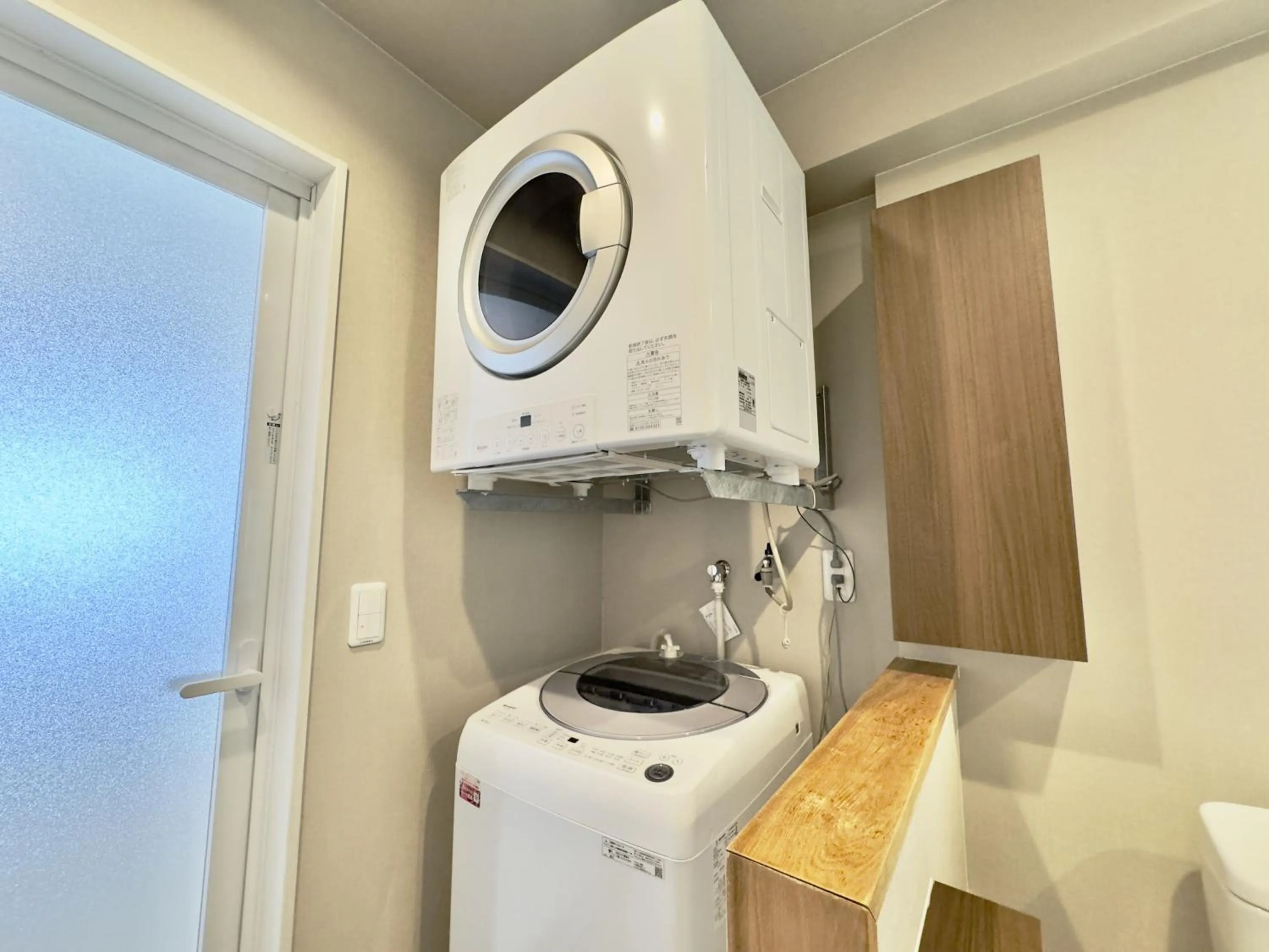 washing machine in Coral Palace Onna by Sunset Avenue