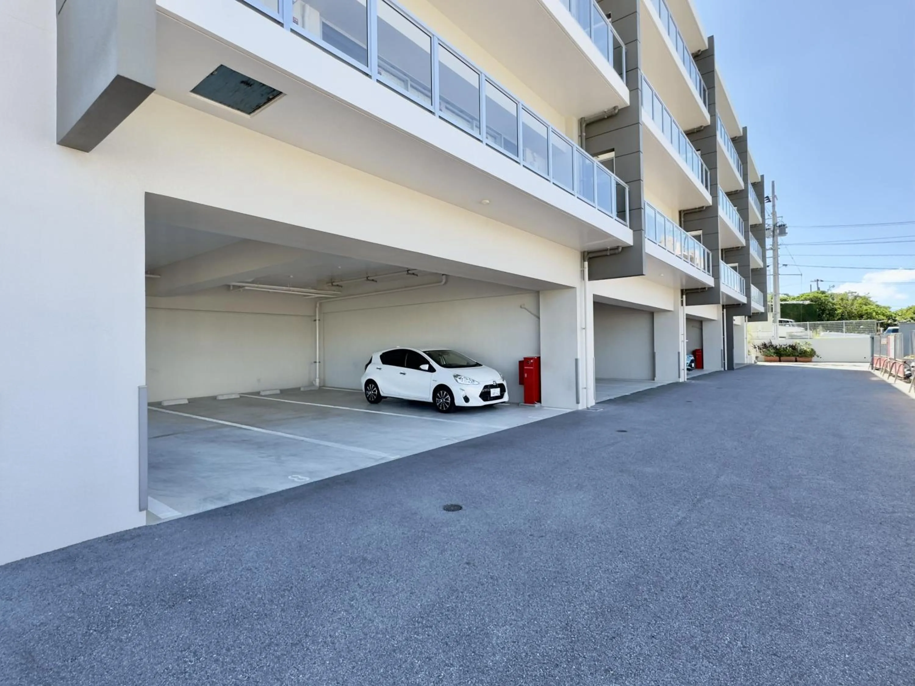 Parking in Coral Palace Onna by Sunset Avenue