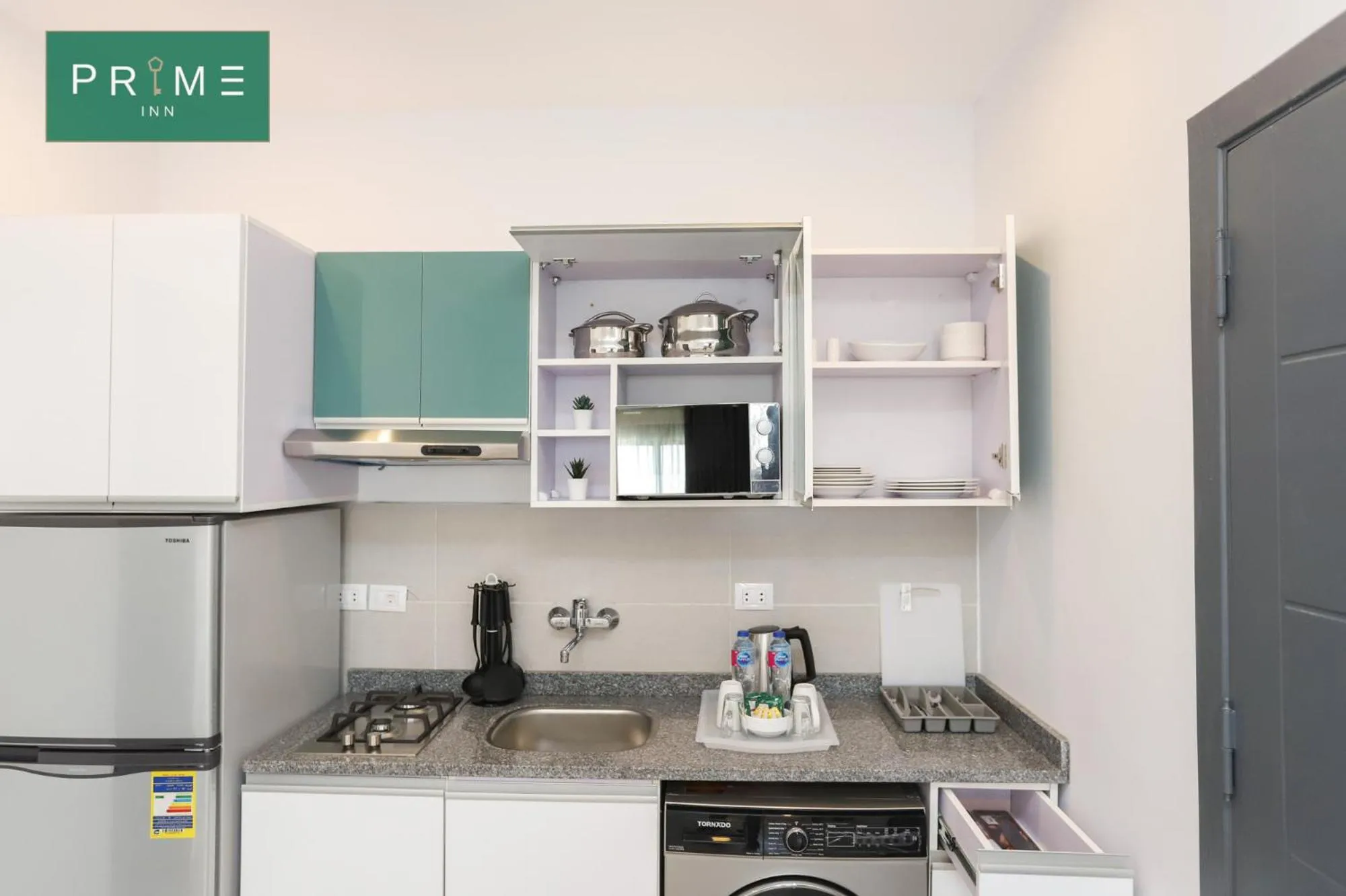 Kitchen or kitchenette in Prime Inn 10th Of Ramadan