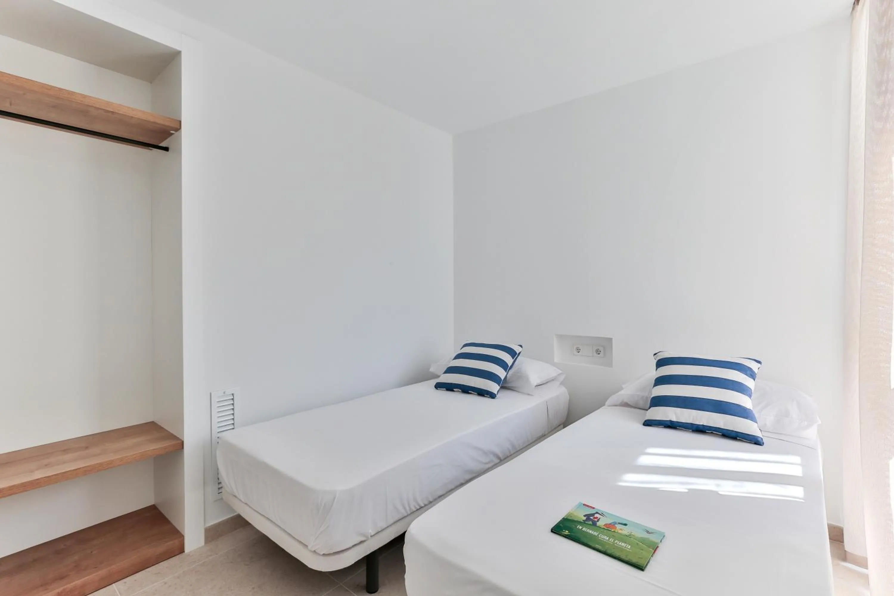 Bed in ECO-APARTMENTS LA MARINEDA