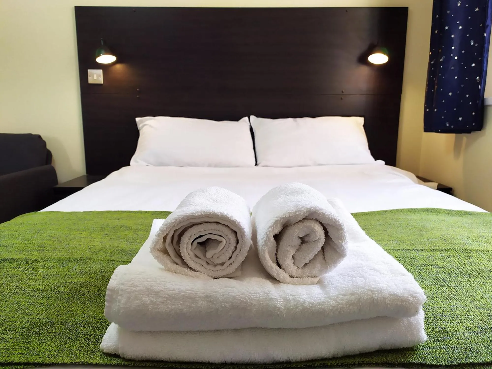 Bedroom, Bed in The Yew Studio - Self contained one bed studio flat with parking