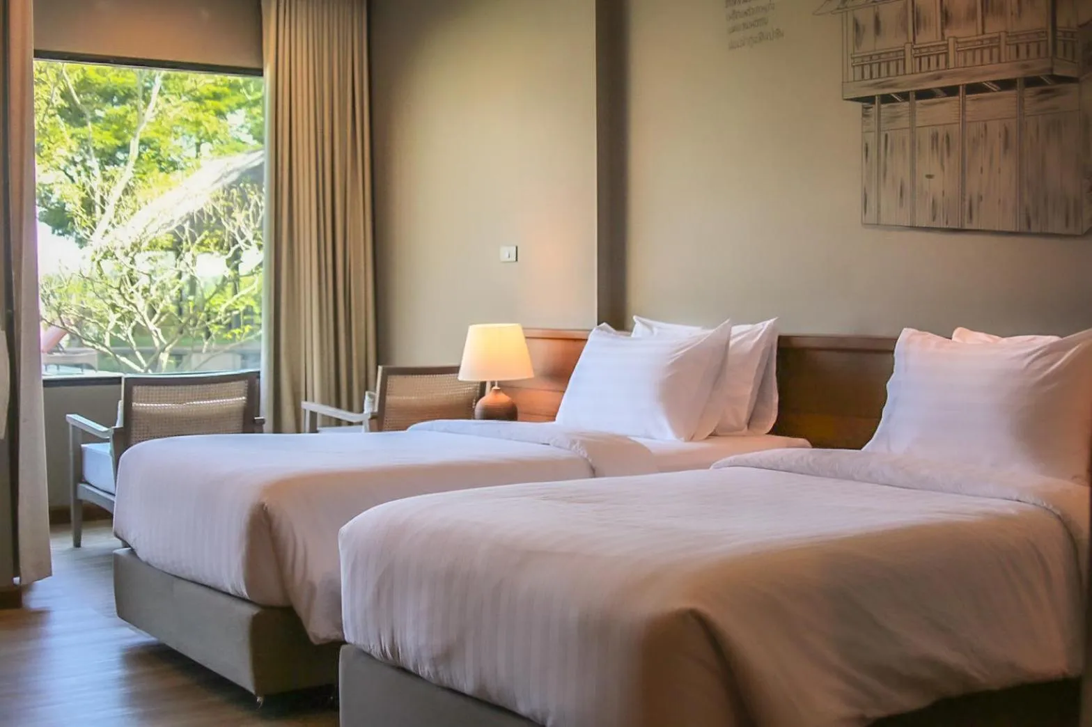 Bed in River Tree Resort