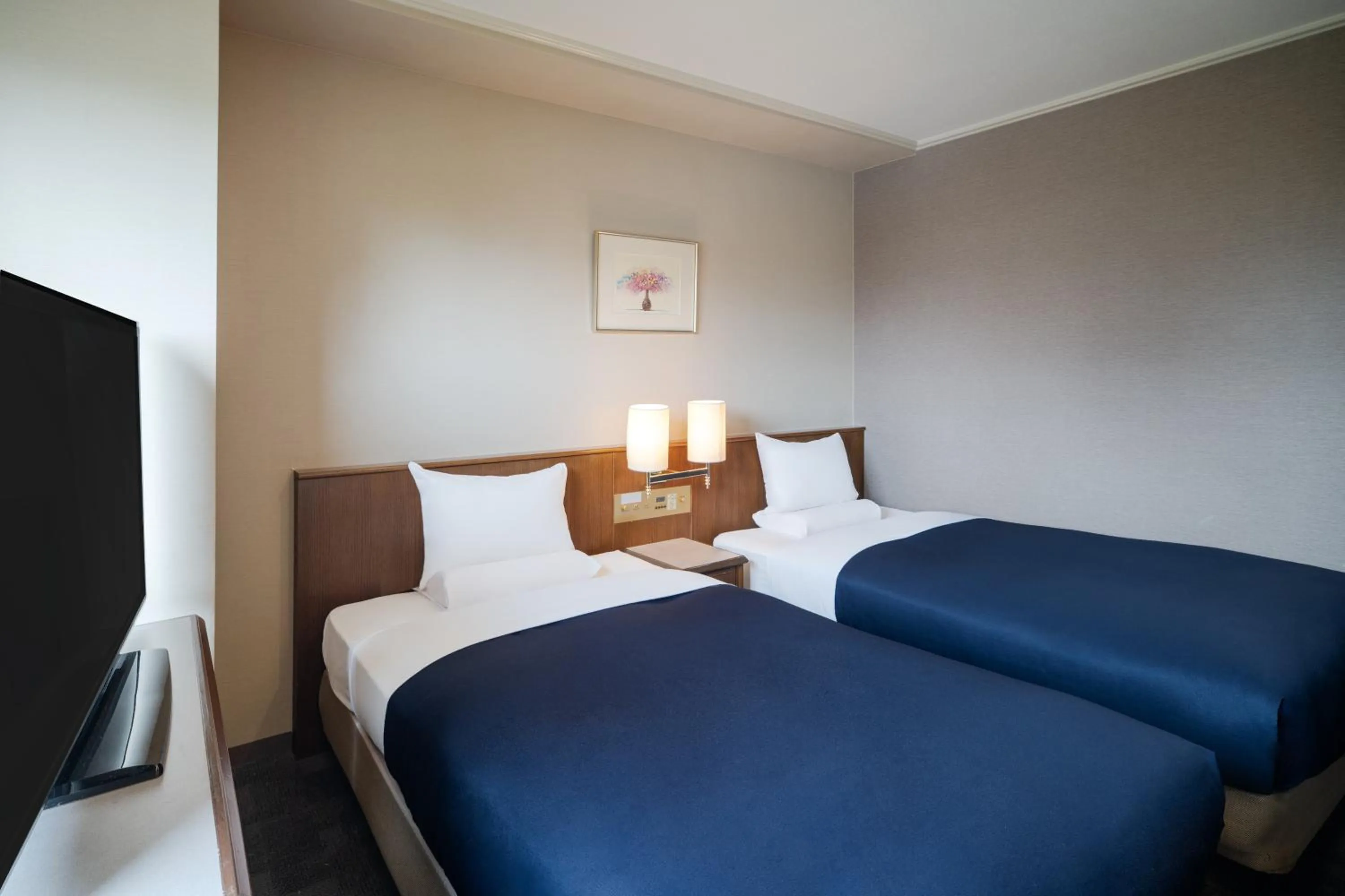 Bed in HOTEL MYSTAYS Hiroshima Peace Park