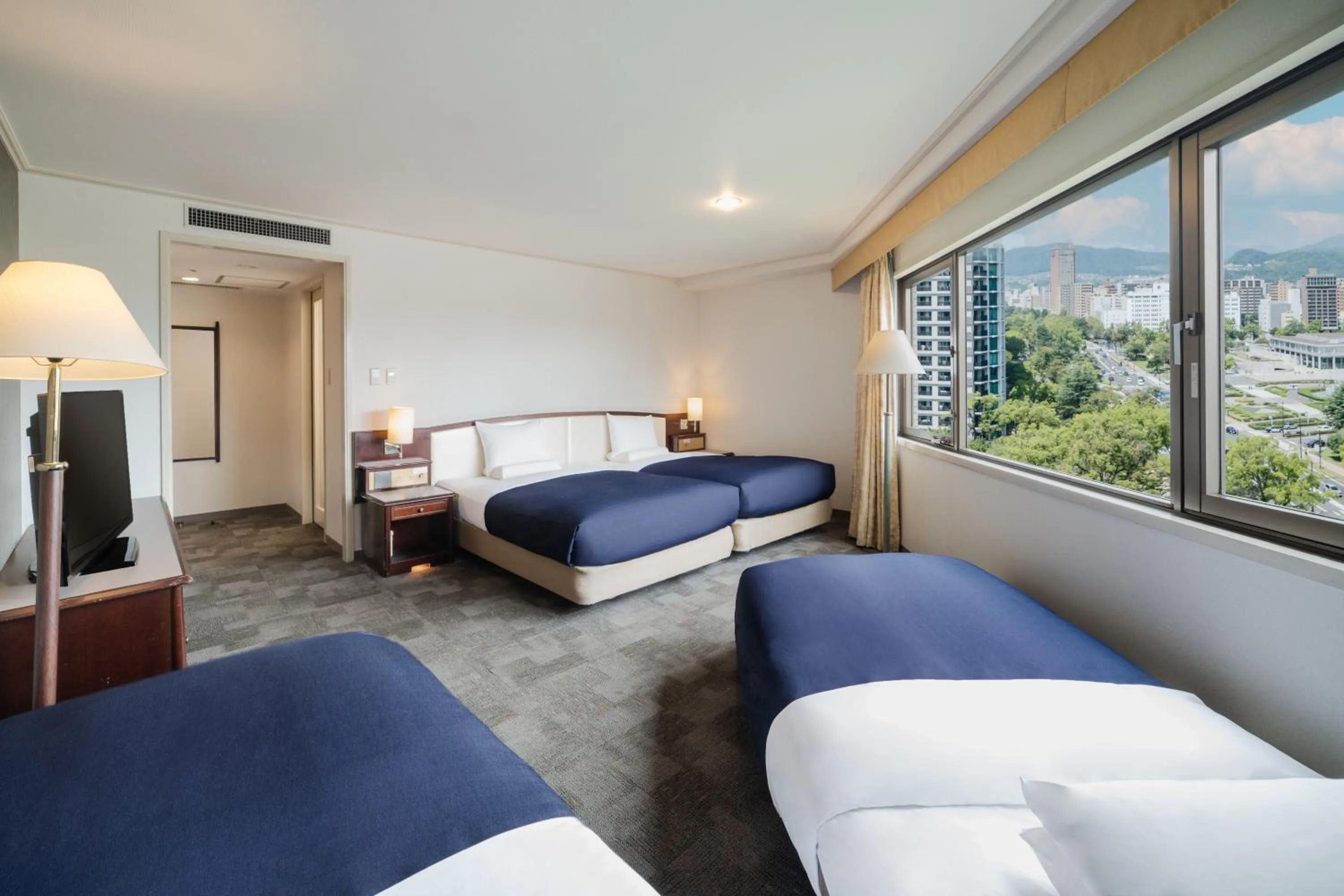 Bed in HOTEL MYSTAYS Hiroshima Peace Park