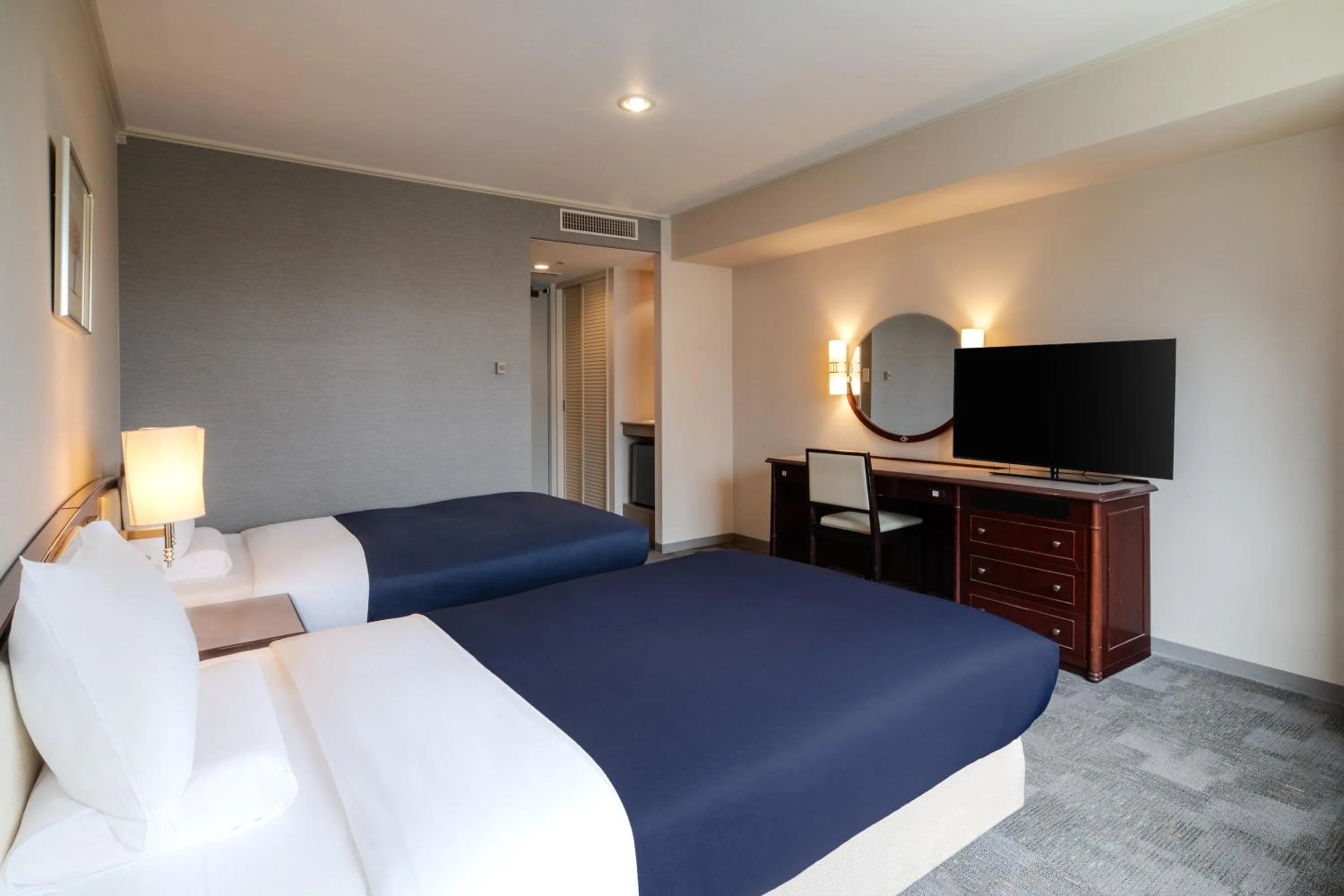 Bed in HOTEL MYSTAYS Hiroshima Peace Park