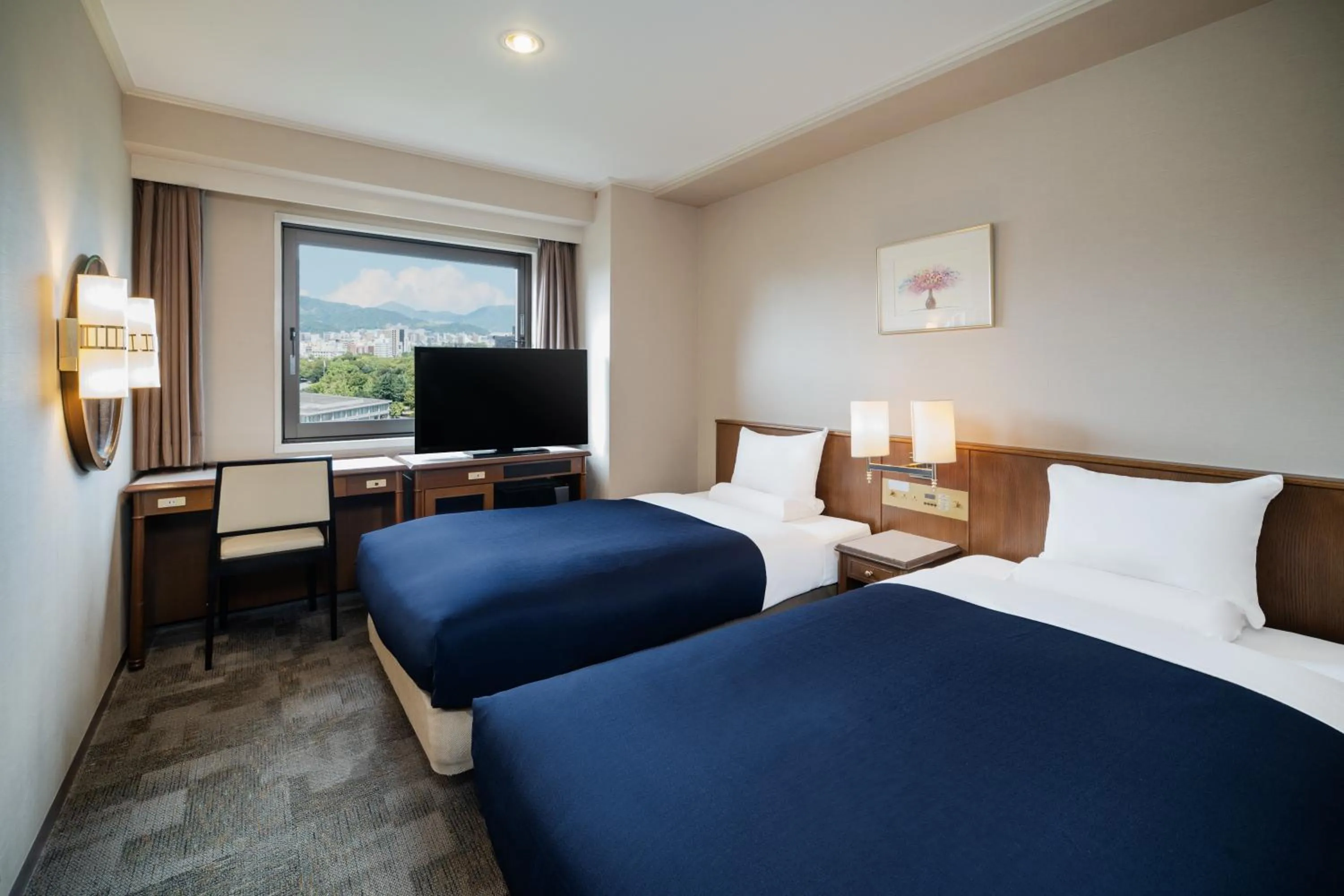 Bed in HOTEL MYSTAYS Hiroshima Peace Park