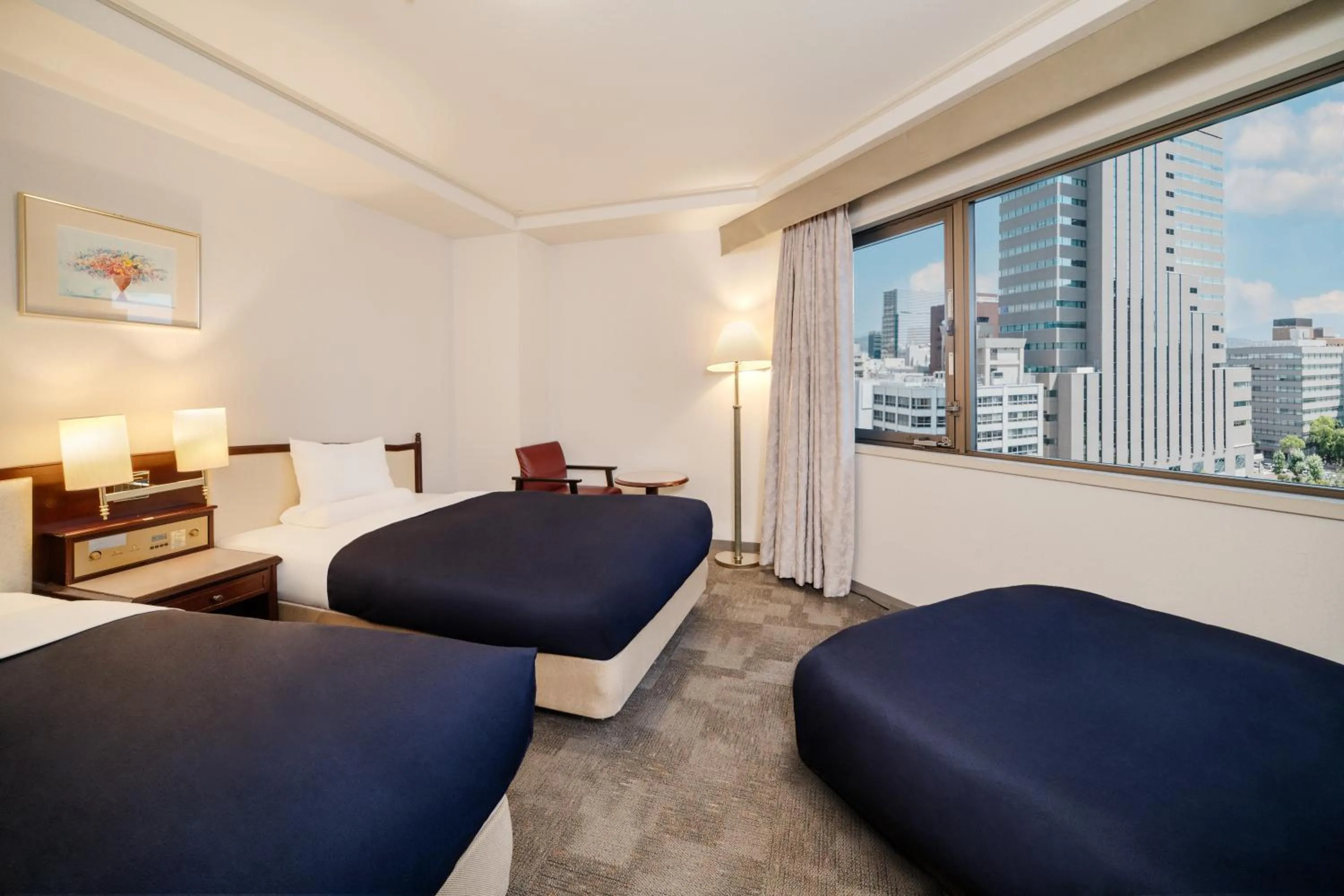 Bed in HOTEL MYSTAYS Hiroshima Peace Park