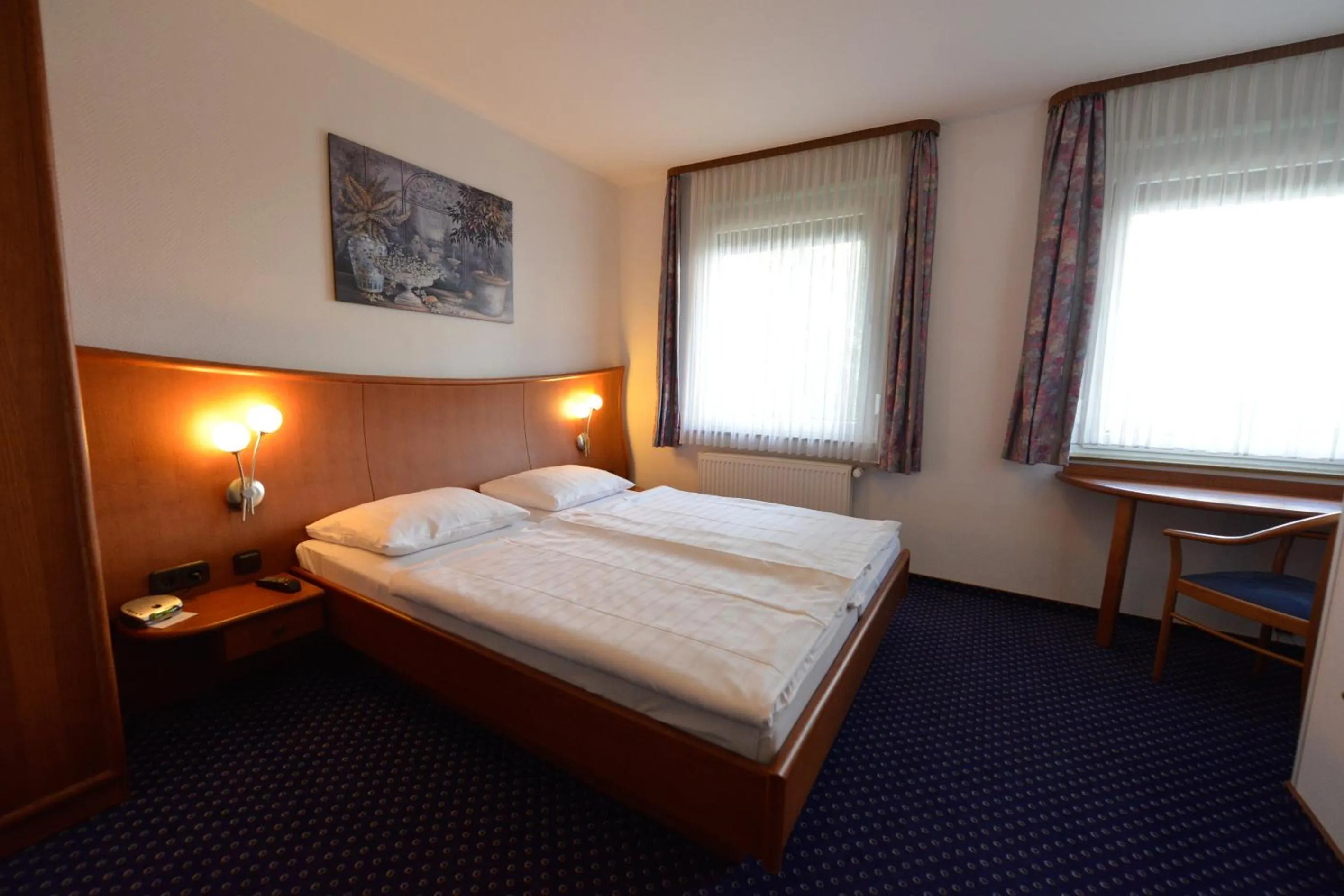 Photo of the whole room, Bed in Trollinger Hof