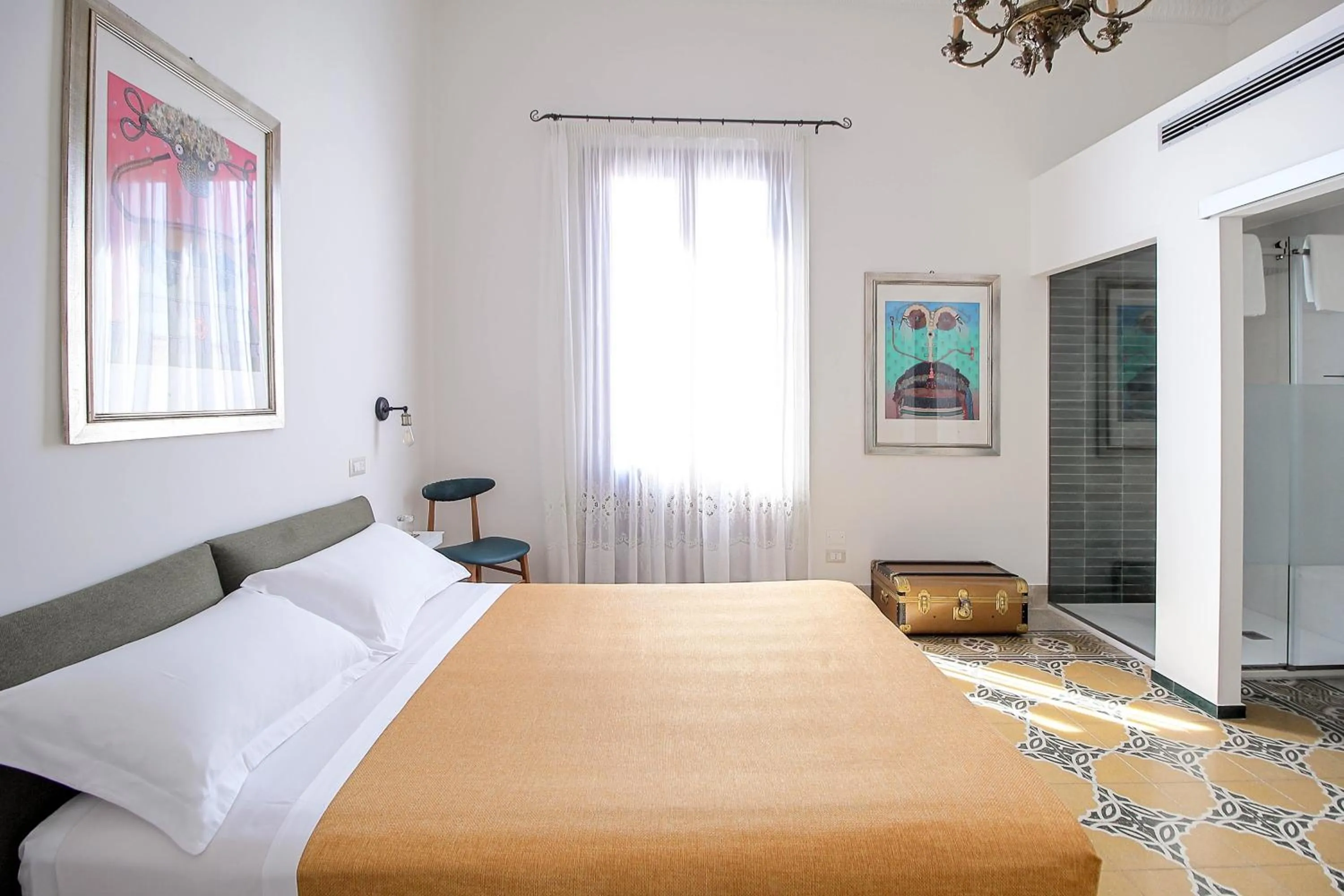 Bed in DOMUS ALERIA Deluxe Rooms