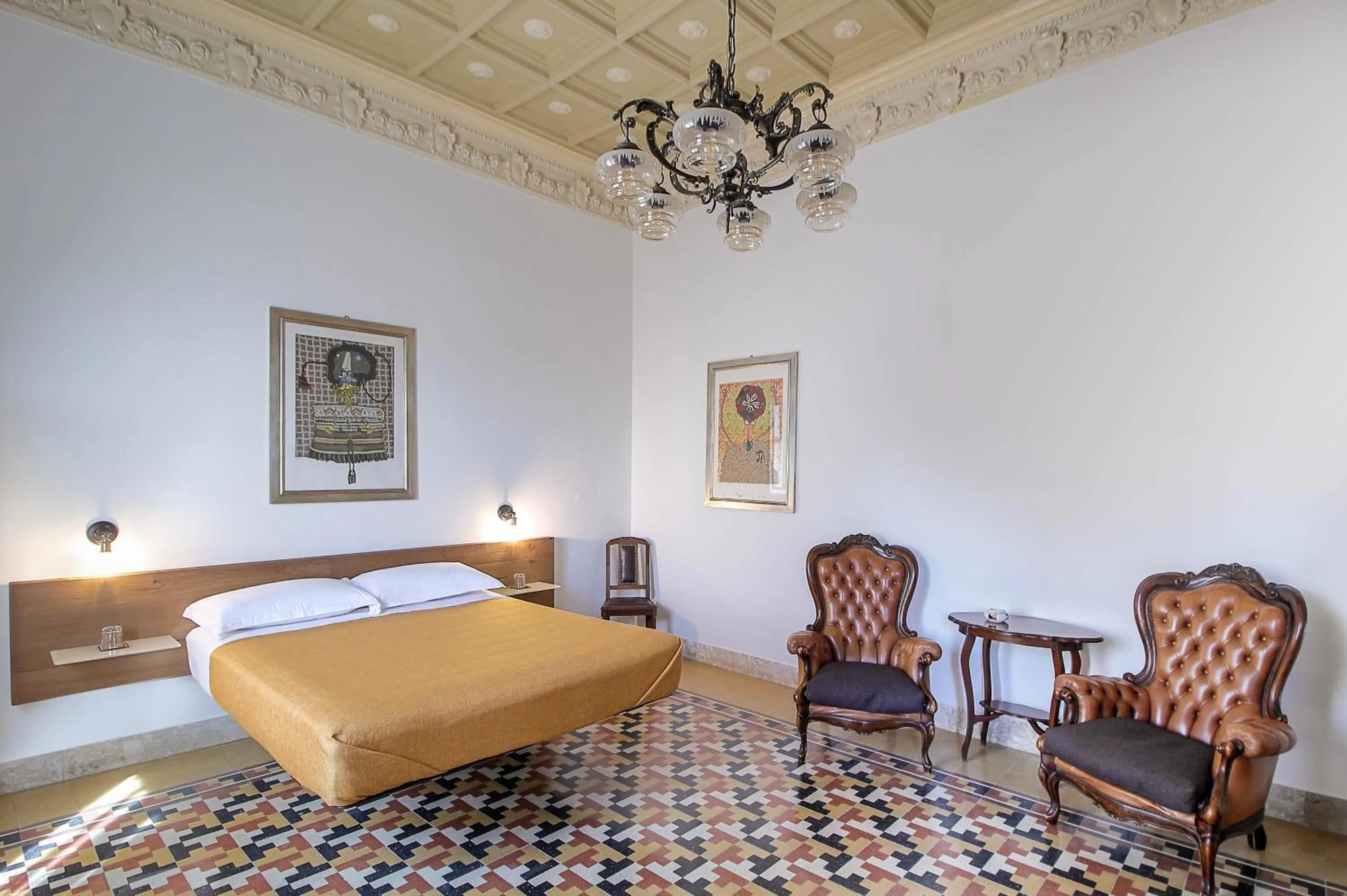 Bed in DOMUS ALERIA Deluxe Rooms